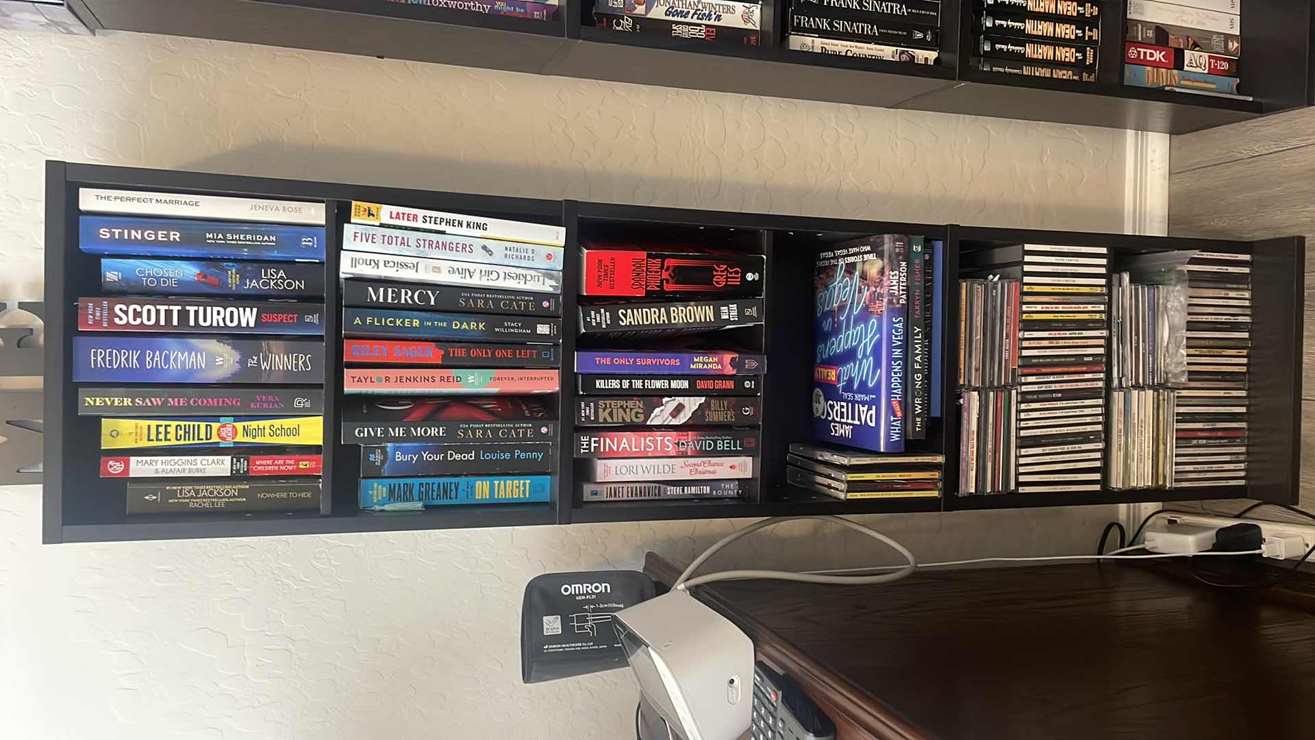 Photo 1 of BOOKCASE BOOKS AND CDS 13" X 6" H54"