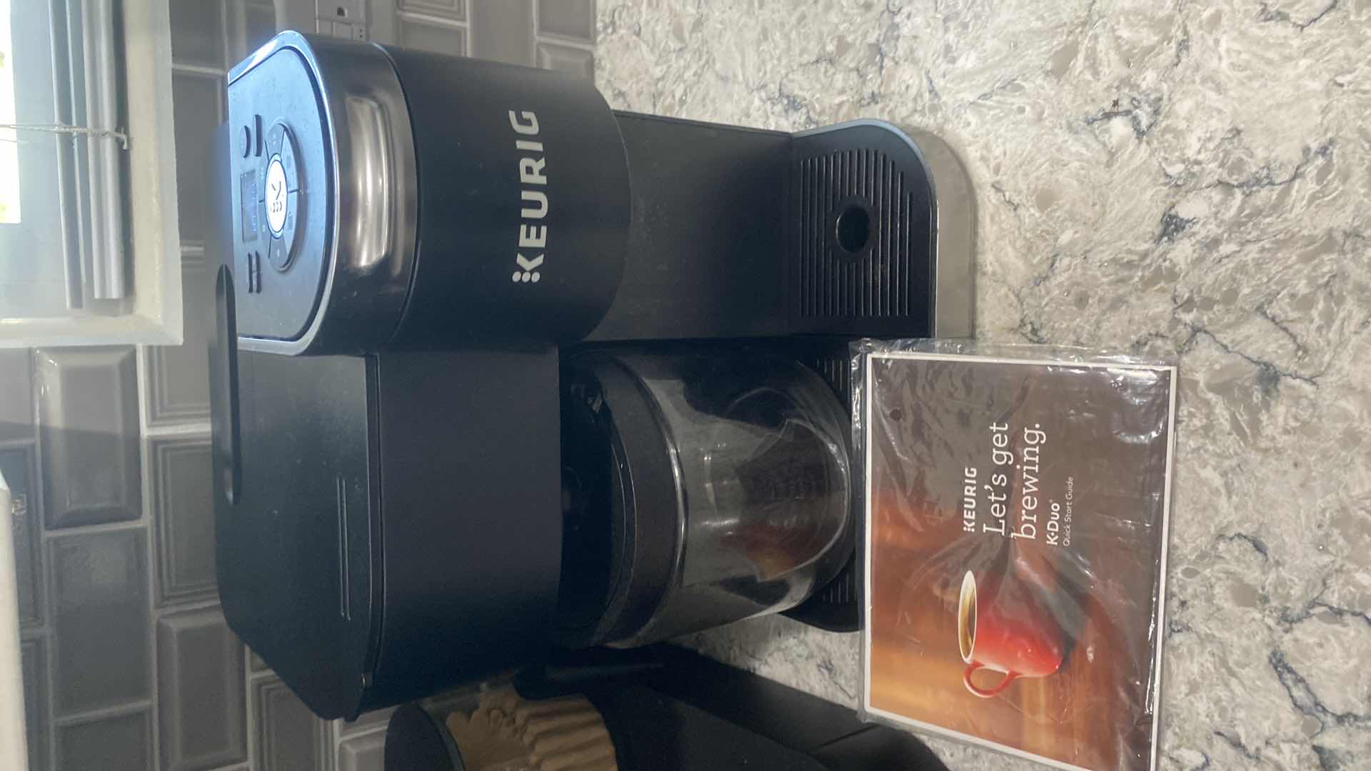 Photo 1 of KEURIG WITH POD STATION