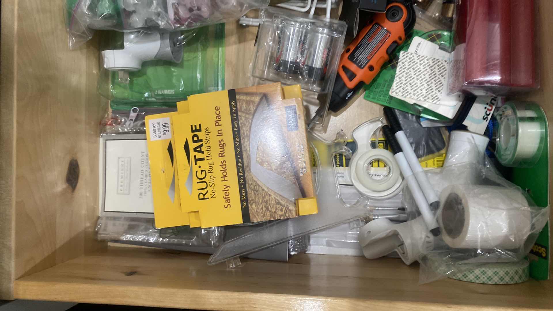 Photo 2 of CONTENTS KITCHEN - JUNK DRAWER - CANDLES RUG TAPE GLOVES & MORE