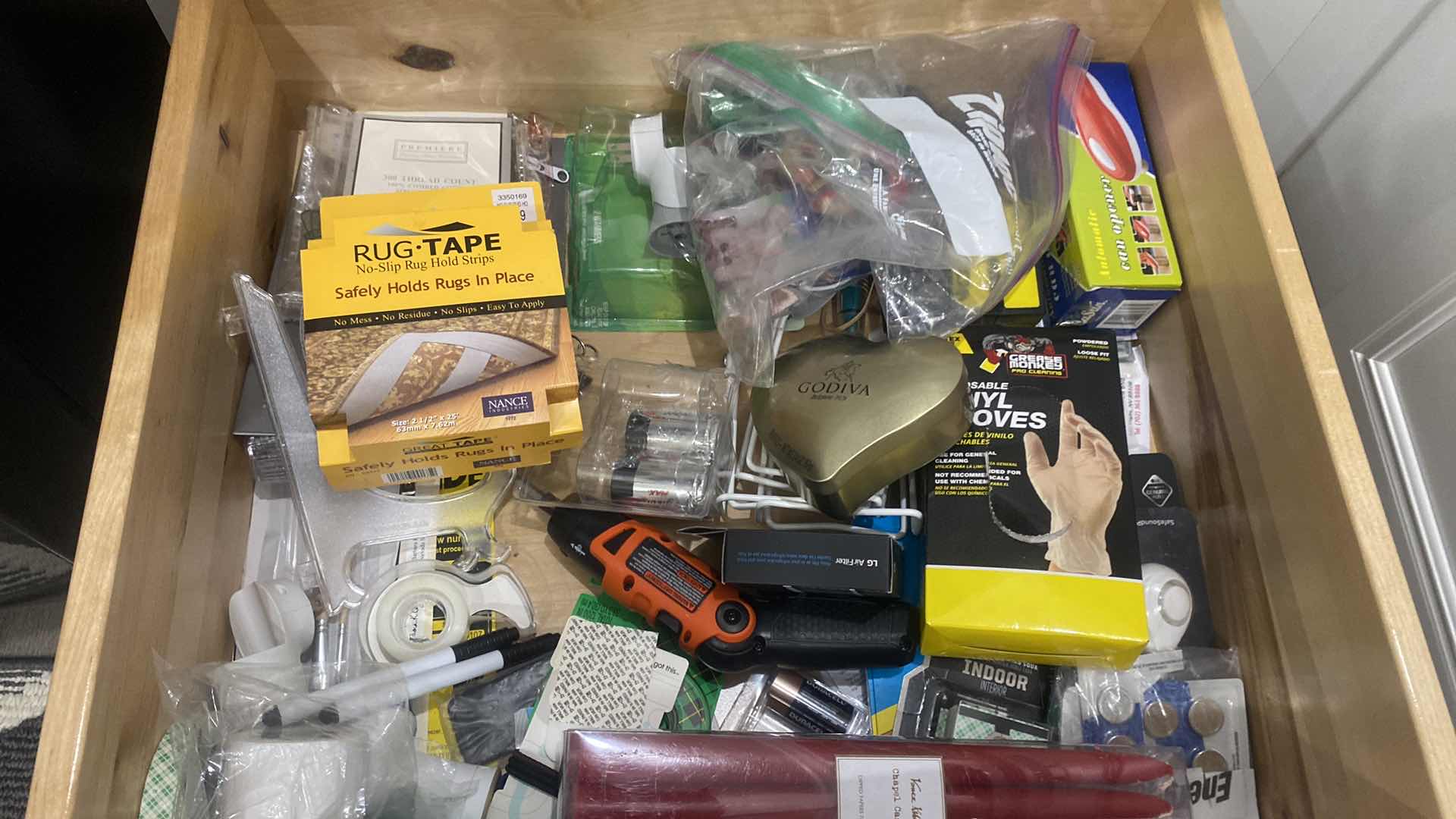 Photo 1 of CONTENTS KITCHEN - JUNK DRAWER - CANDLES RUG TAPE GLOVES & MORE