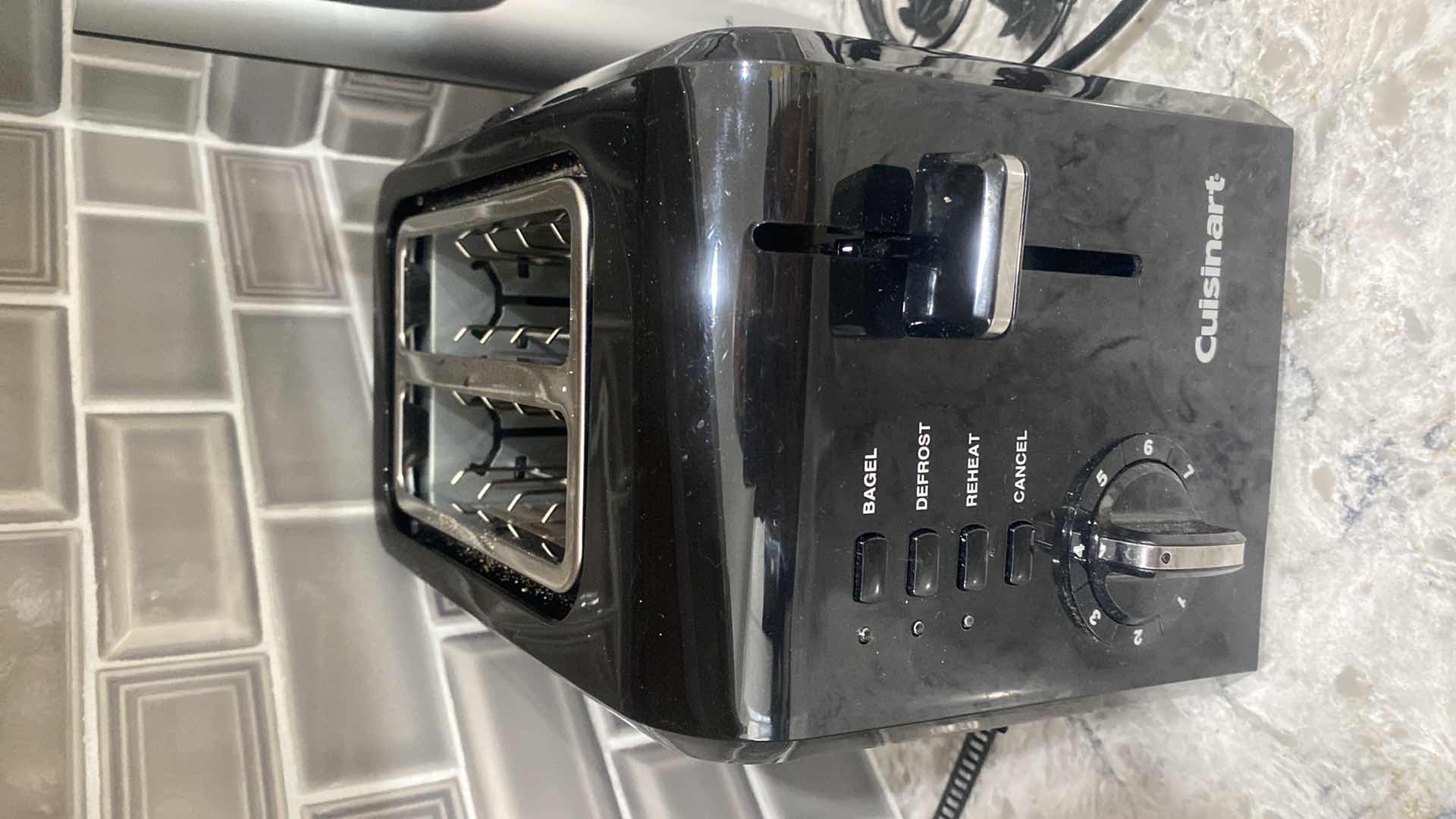 Photo 1 of CUISINART 2 SLICE TOASTER BANANA HOLDER WINE OPENER & PAPER TOEEL HOLDER