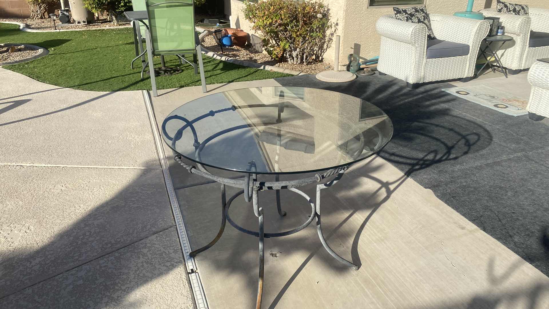 Photo 1 of 36” ROUND GLASS TOP & IRON TABLE H 30”