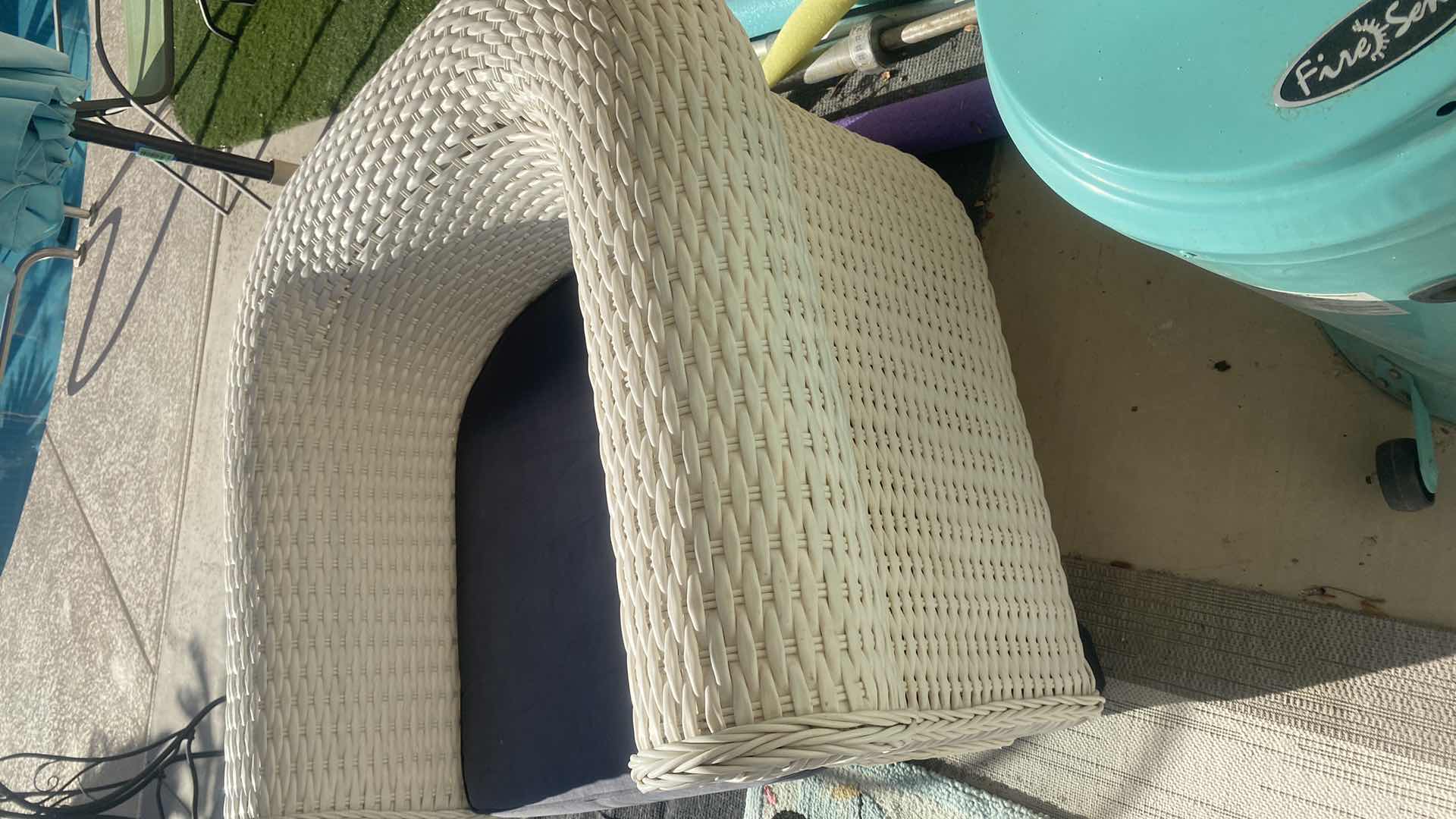 Photo 1 of PLASTIC WICKER PATIO CHAIR WITH FADED BLACK CUSHION 42“ x 33“ H 29” (2 available each sold separately)