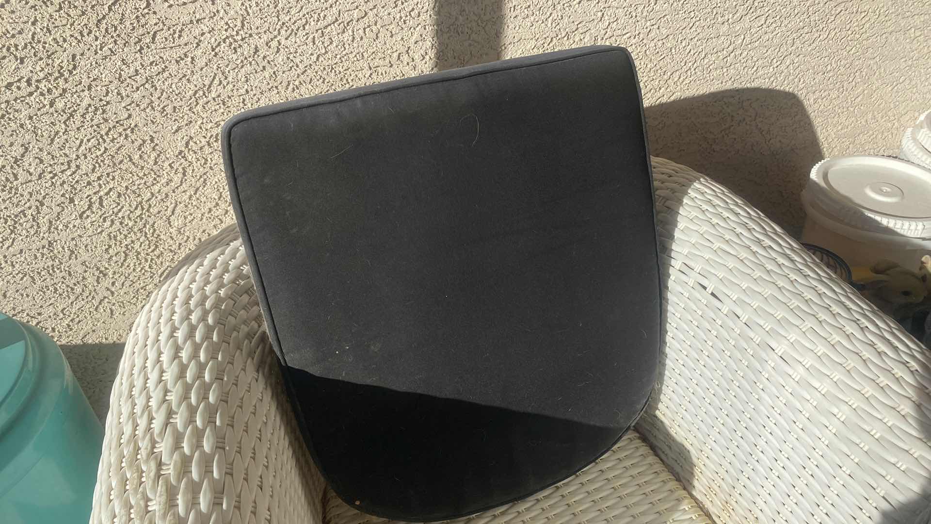 Photo 1 of PLASTIC WICKER PATIO CHAIR WITH FADED BLACK CUSHION 42“ x 33“ H 29” (2 available each sold separately)