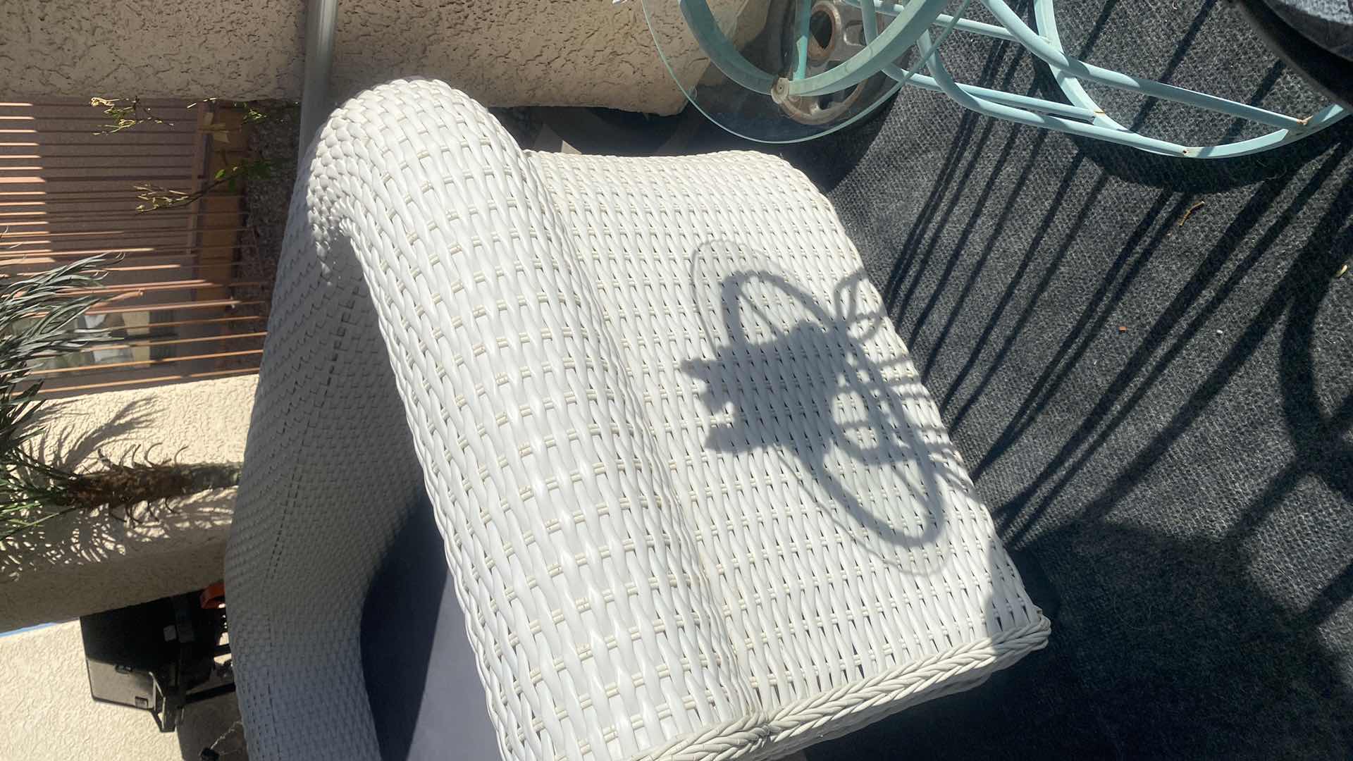 Photo 1 of PLASTIC WICKER OUTDOOR SOFA WITH FADED BLACK CUSHION 80” x 33“ H 27”