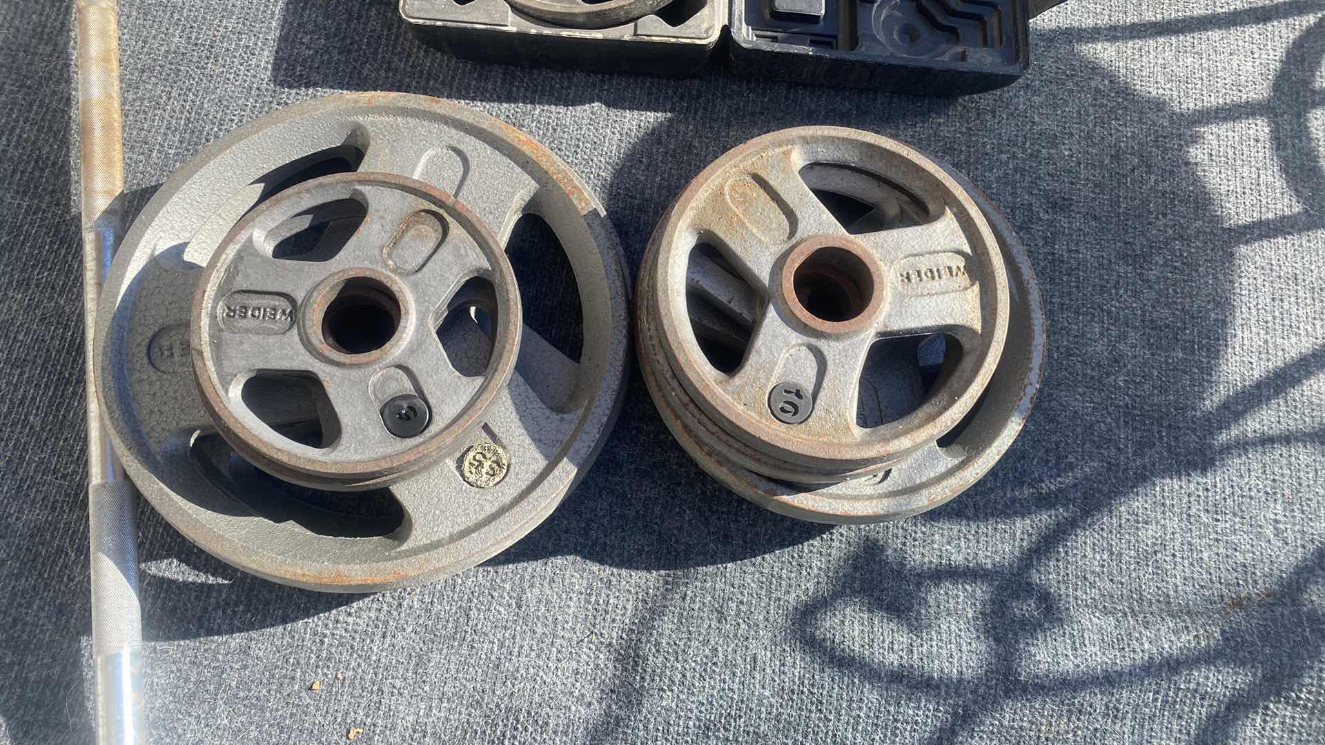 Photo 1 of 12-WEIDER ASSORTED WEIGHTS WITH BAR