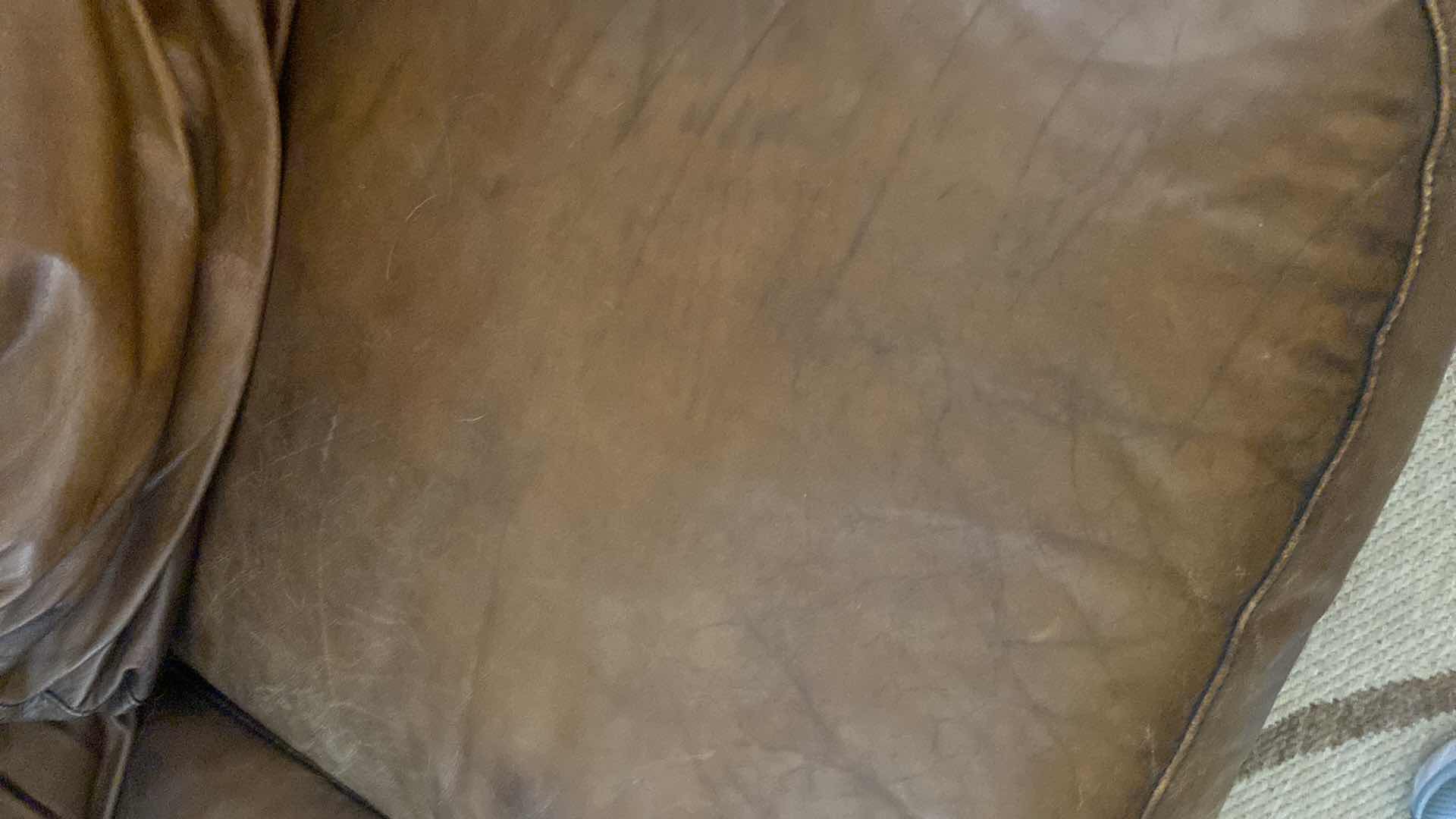 Photo 1 of 88” LEATHER MART BROWN WITH ROLLED ARMS & NAILHEAD TRIM