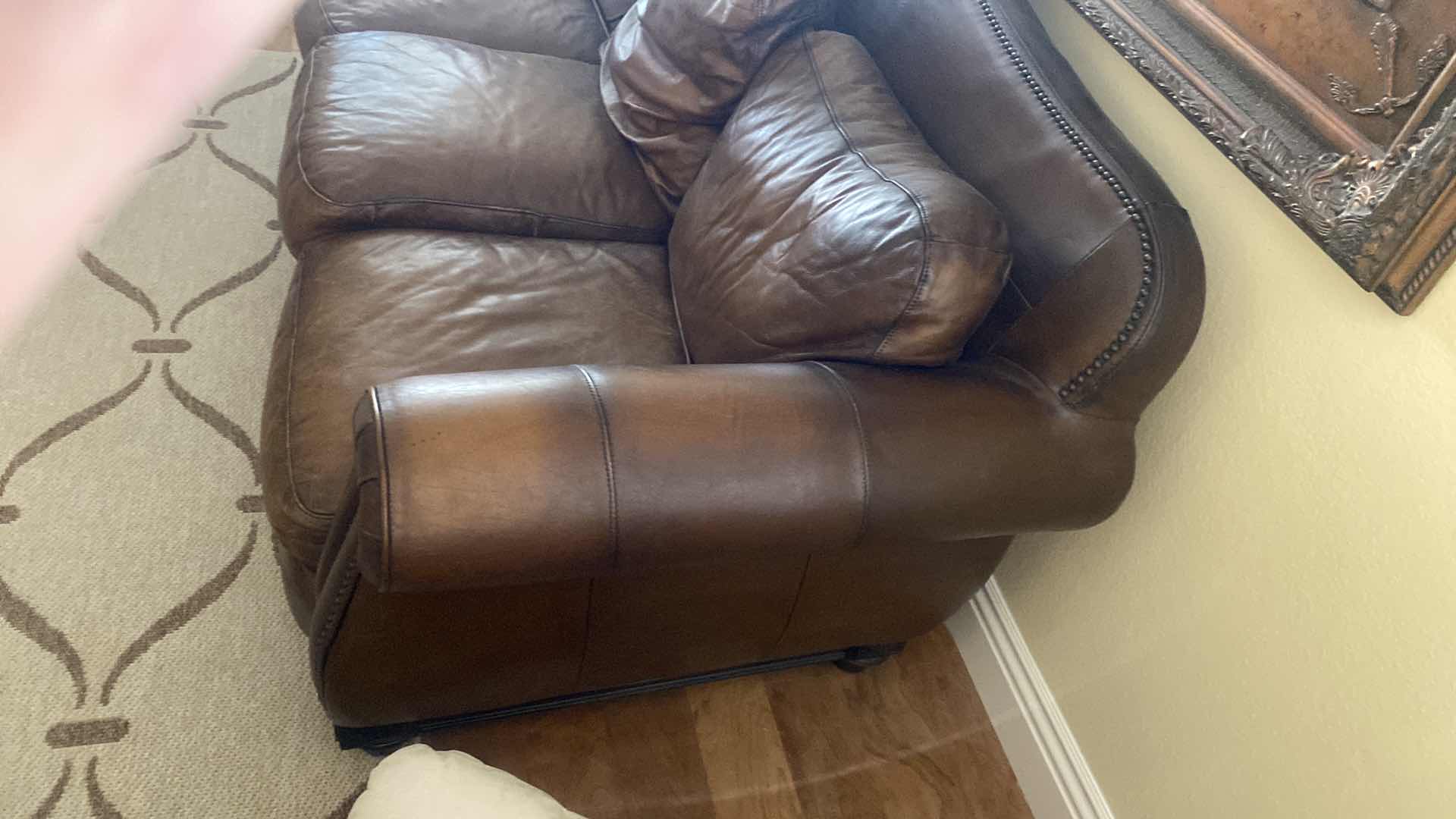 Photo 1 of 88” LEATHER MART BROWN WITH ROLLED ARMS & NAILHEAD TRIM