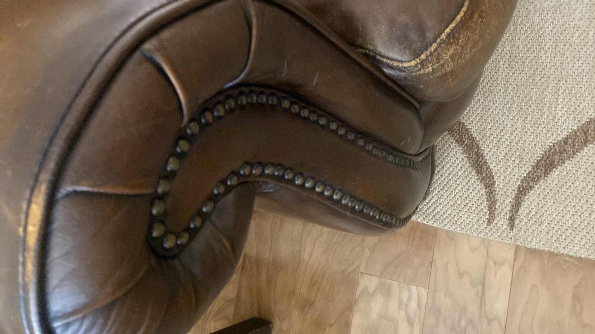 Photo 1 of 88” LEATHER MART BROWN WITH ROLLED ARMS & NAILHEAD TRIM