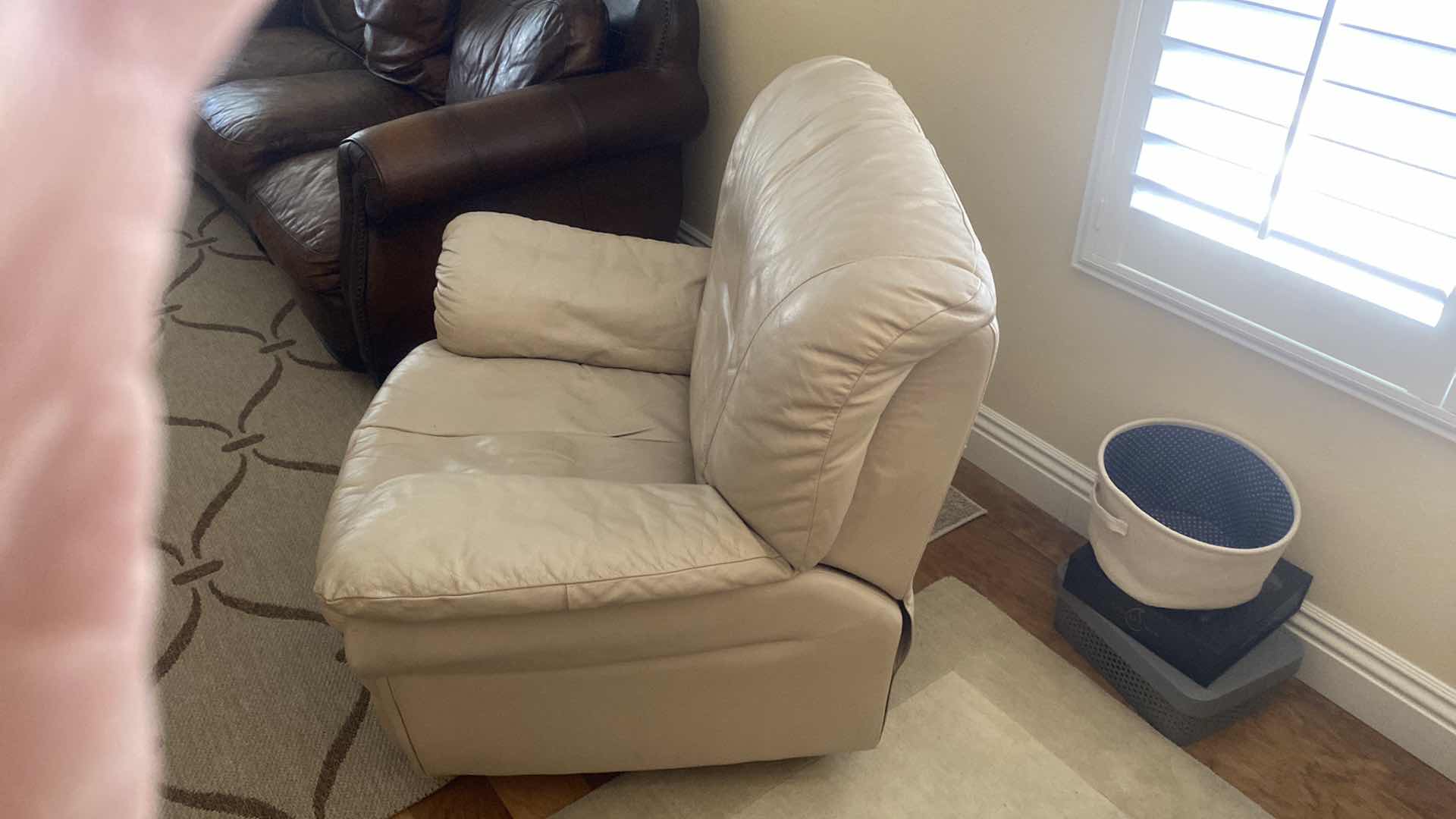 Photo 1 of BEIGE SWIVEL MANUAL LEATHER RECLINER 42“ x 36“ H 34”