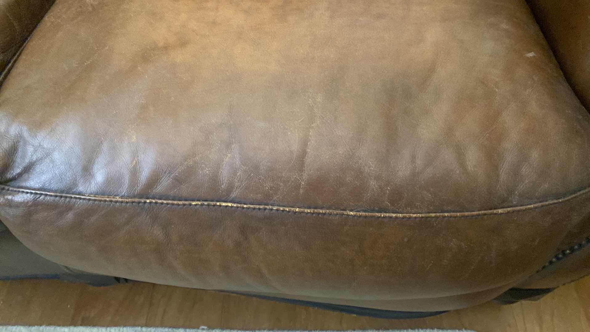 Photo 1 of 67” LEATHER MART BROWN WITH ROLLED ARMS & NAILHEAD TRIM LOVESEAT