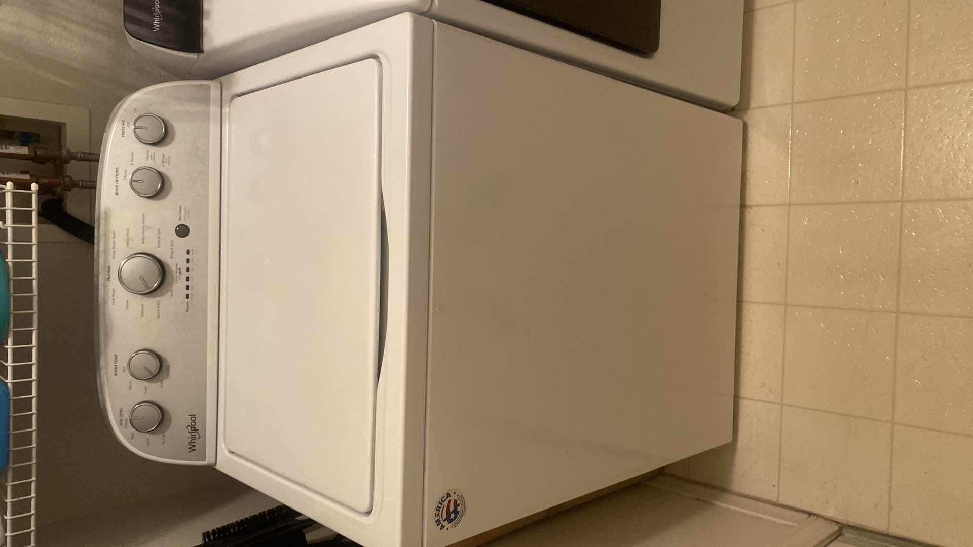 Photo 1 of WHIRLPOOL CLOTHES WASHER MODEL WTW50000DW2