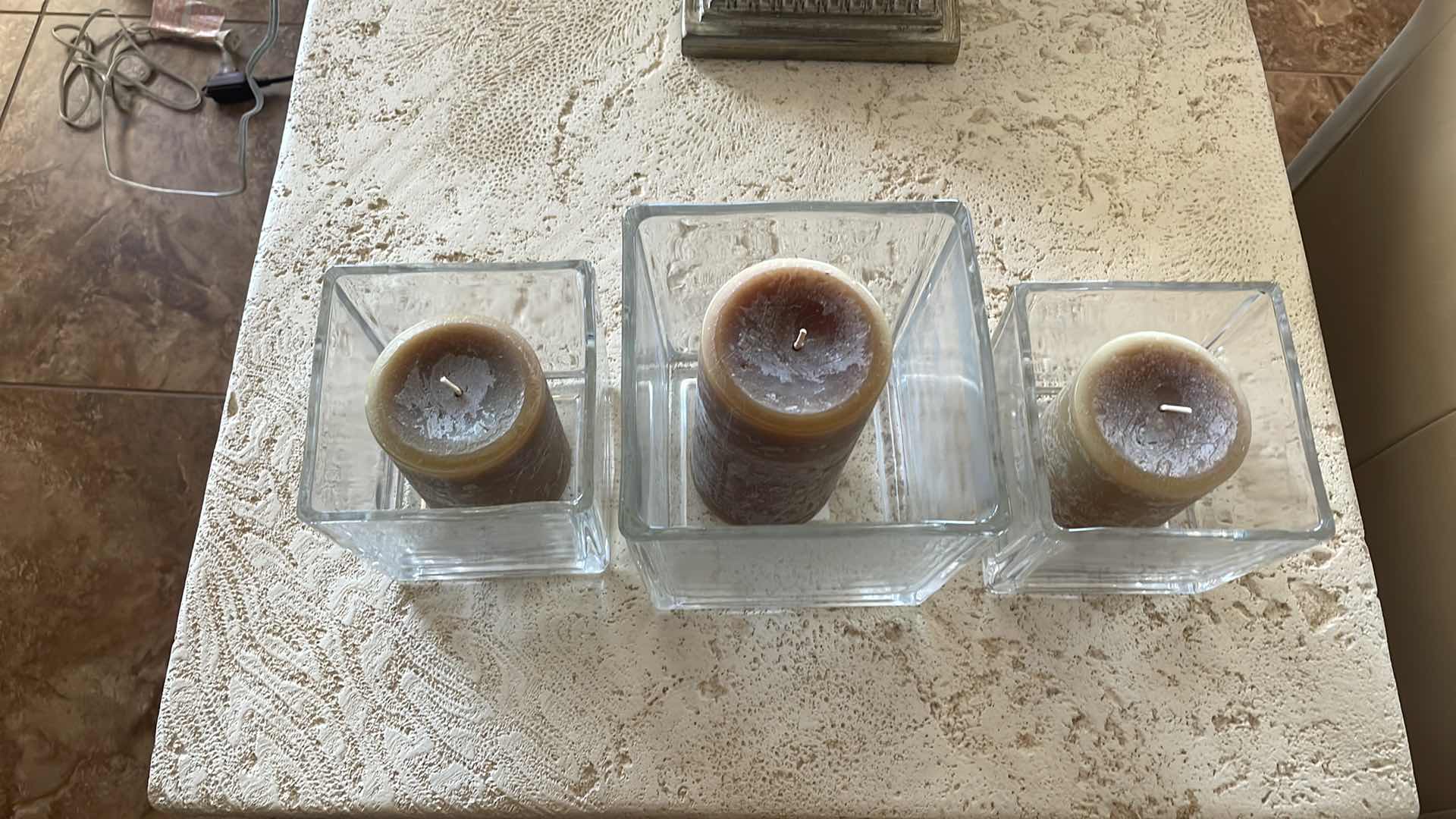 Photo 1 of HEAVY GLASS CANDLE HOLDERS 5”x5”