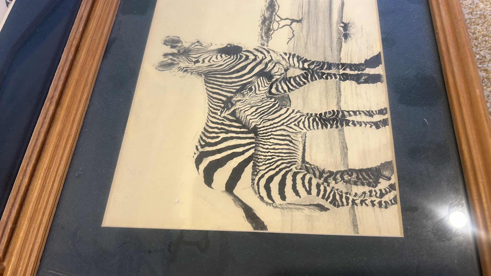 Photo 1 of 4 - FRAMED BLACK AND WHITE ANIMAL ARTWORK. 12” x H 15”