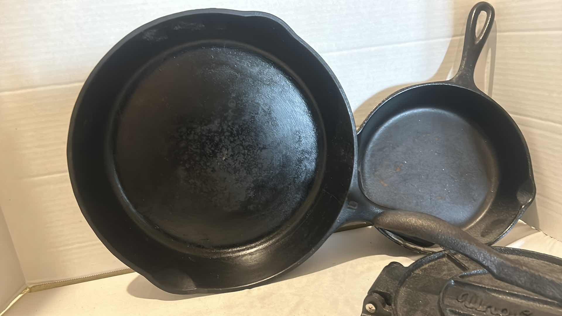 Photo 1 of 7 PC - CAST IRON PANS, METAL TRIVETS