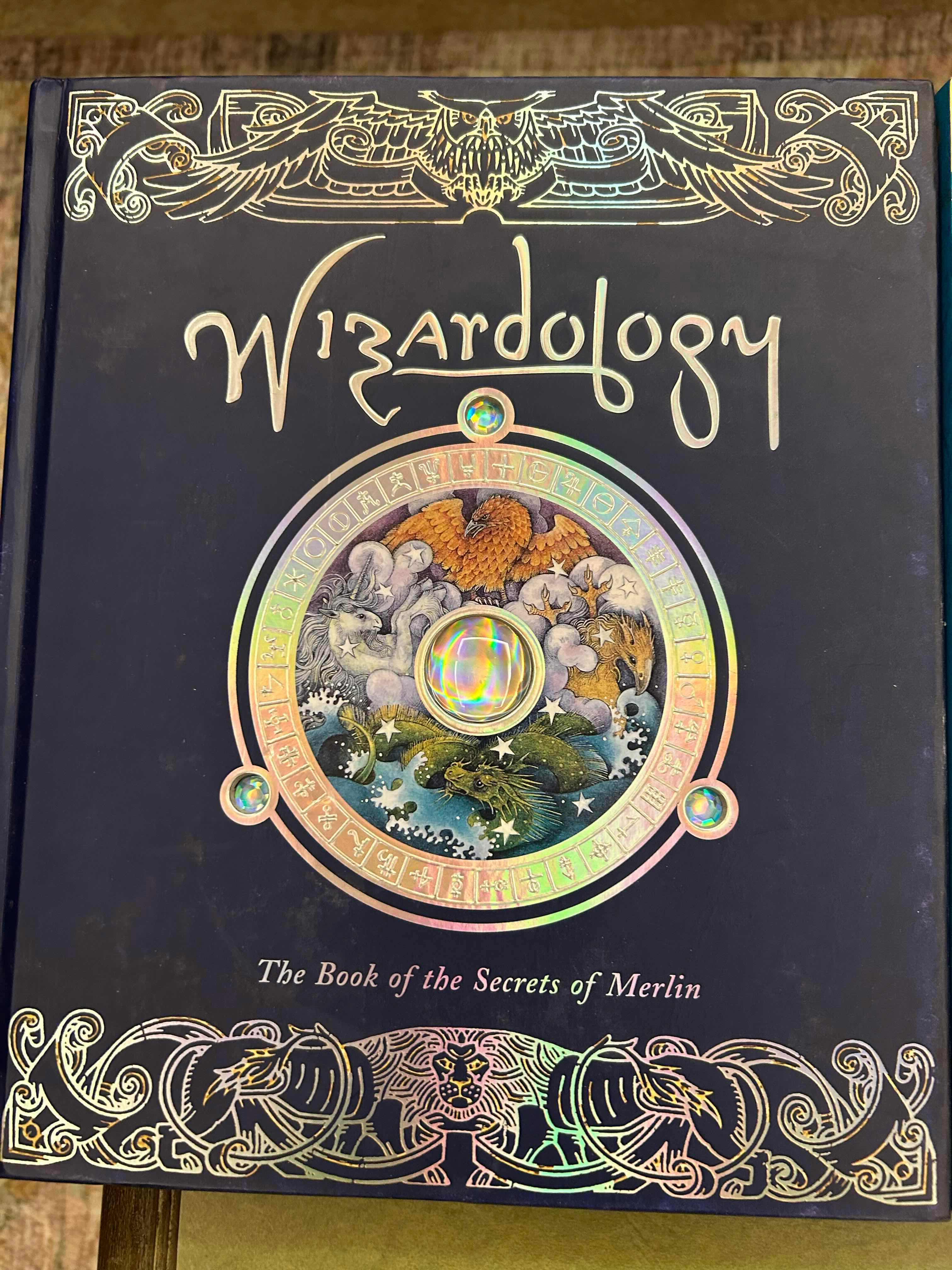 Photo 1 of 3-HARDBOUND BOOKS OF WIZARDOLOGY,  MYTHOLOGY, PIRATEOLOGY