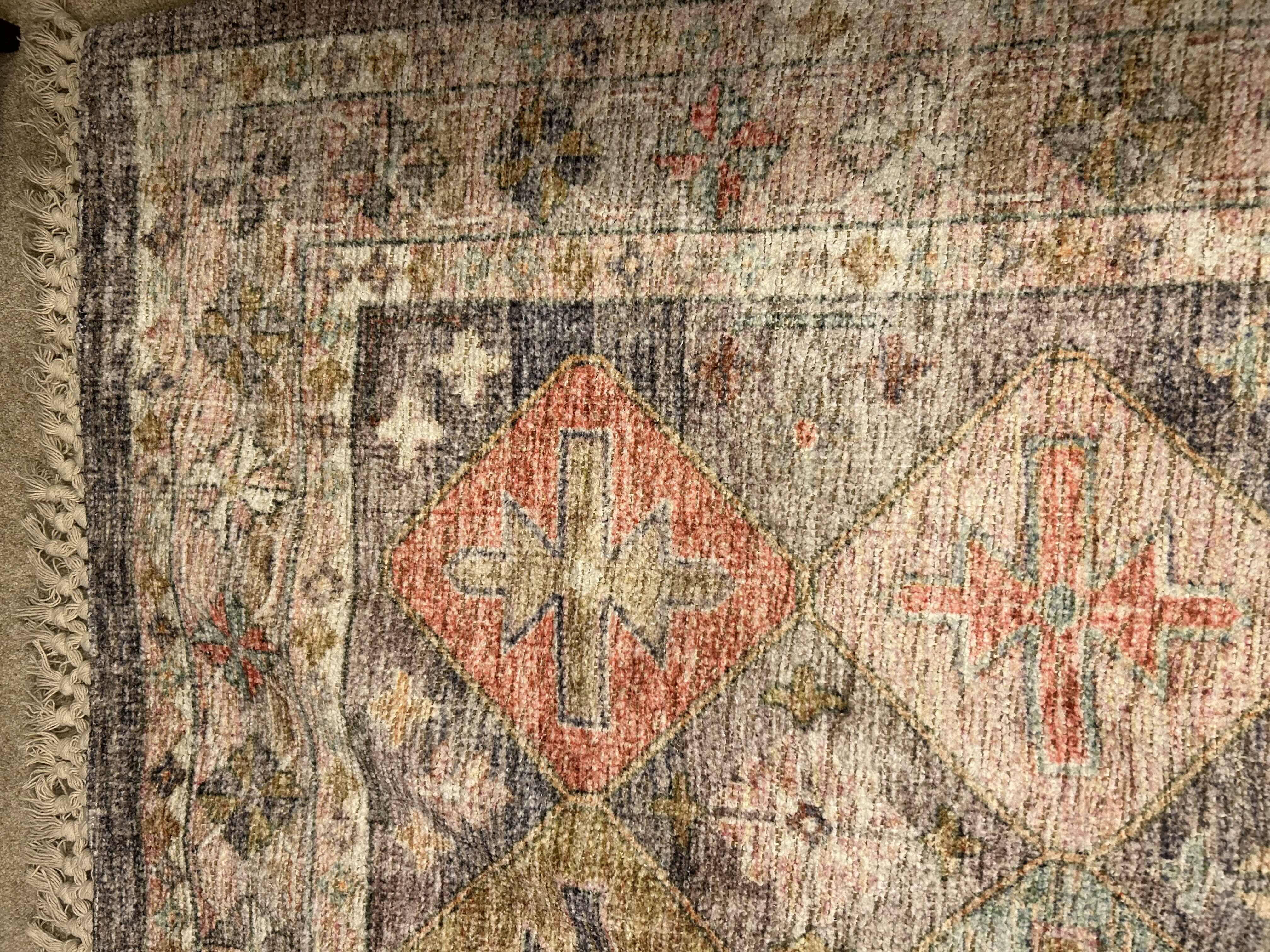 Photo 1 of AREA RUG W FRINGED EDGES 5’ x 7’ 