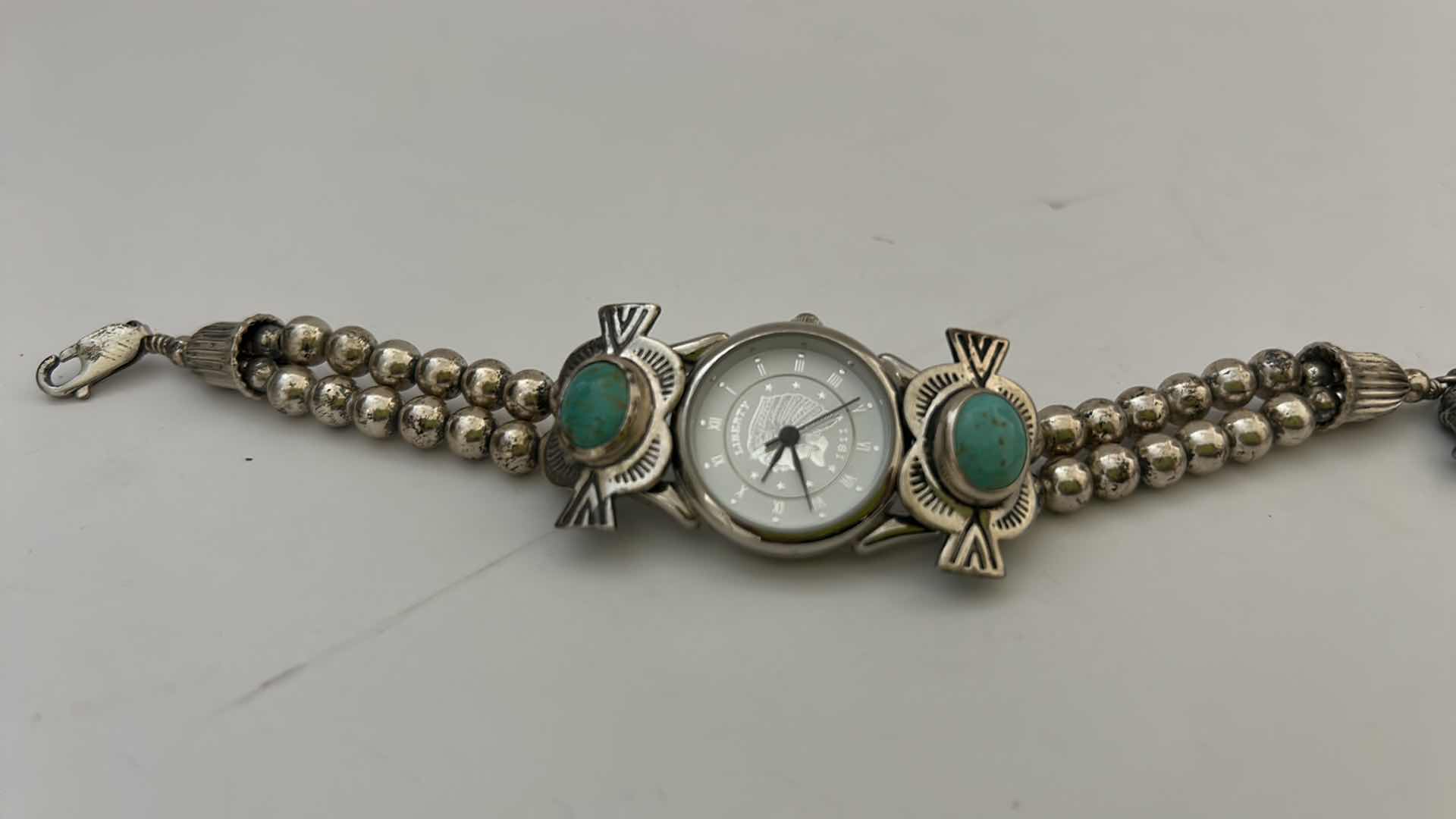 Photo 1 of FINE JEWELRY- WOMEN’S WATCH WITH STERLING SILVER AND TURQUOISE BAND