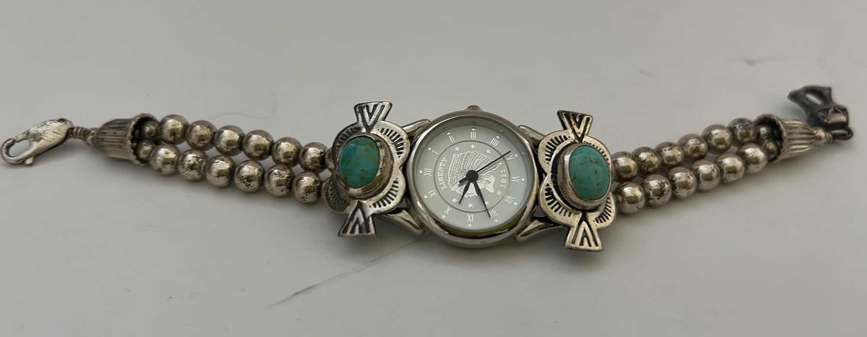Photo 1 of FINE JEWELRY- WOMEN’S WATCH WITH STERLING SILVER AND TURQUOISE BAND
