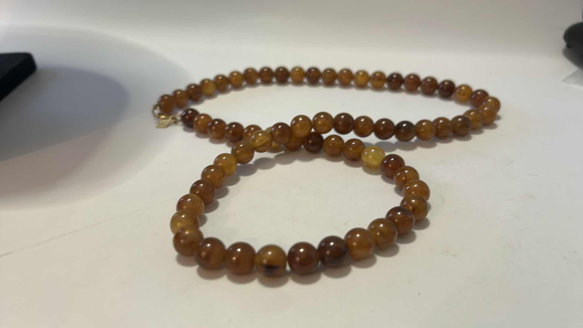 Photo 1 of JEWELRY- 3 LONG BEADED NECKLACES