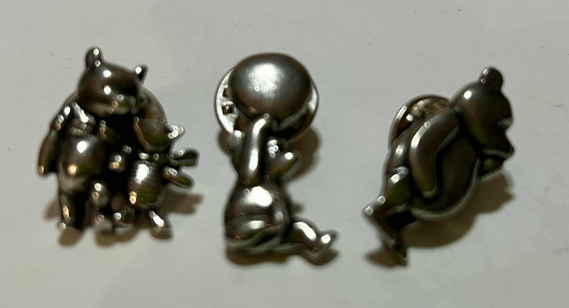 Photo 1 of JEWELRY- 3 SMALL WINNIE THE POOH PUSH PINS