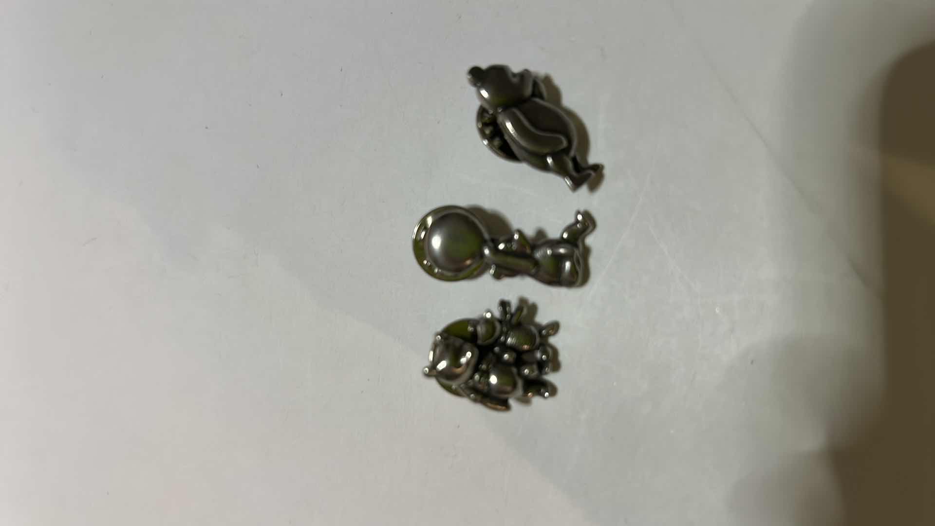 Photo 3 of JEWELRY- 3 SMALL WINNIE THE POOH PUSH PINS