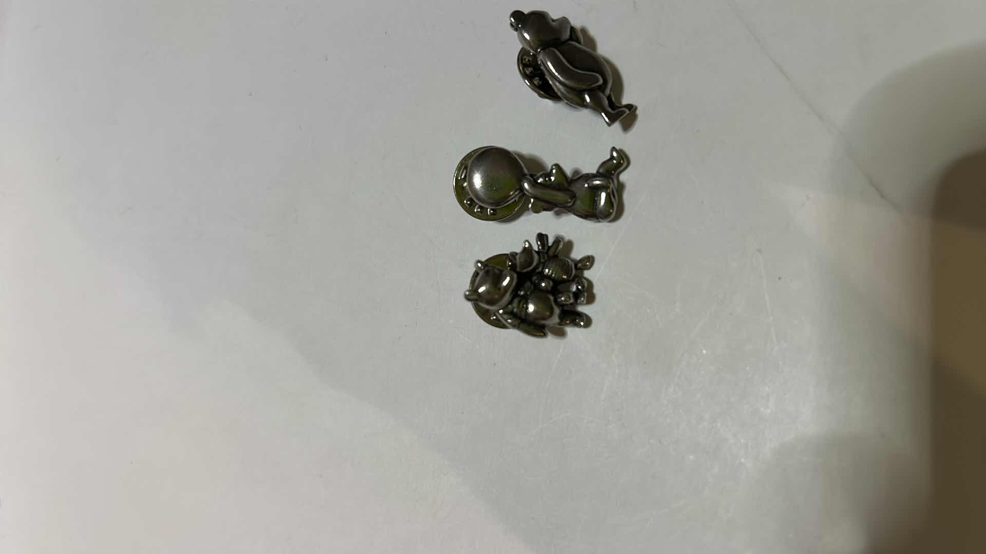 Photo 2 of JEWELRY- 3 SMALL WINNIE THE POOH PUSH PINS