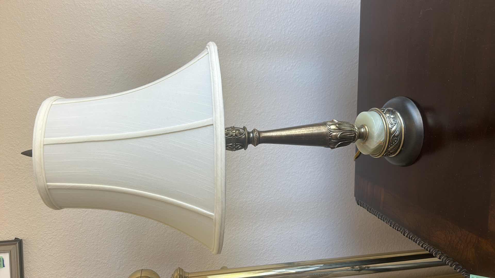 Photo 1 of VINTAGE BRASS LAMP 
WITH ORNATE FLORAL DETAILING. BELL SHAPED LINEN SHADE, ROUND GREEN ONYX STONE ACCENT  H28”