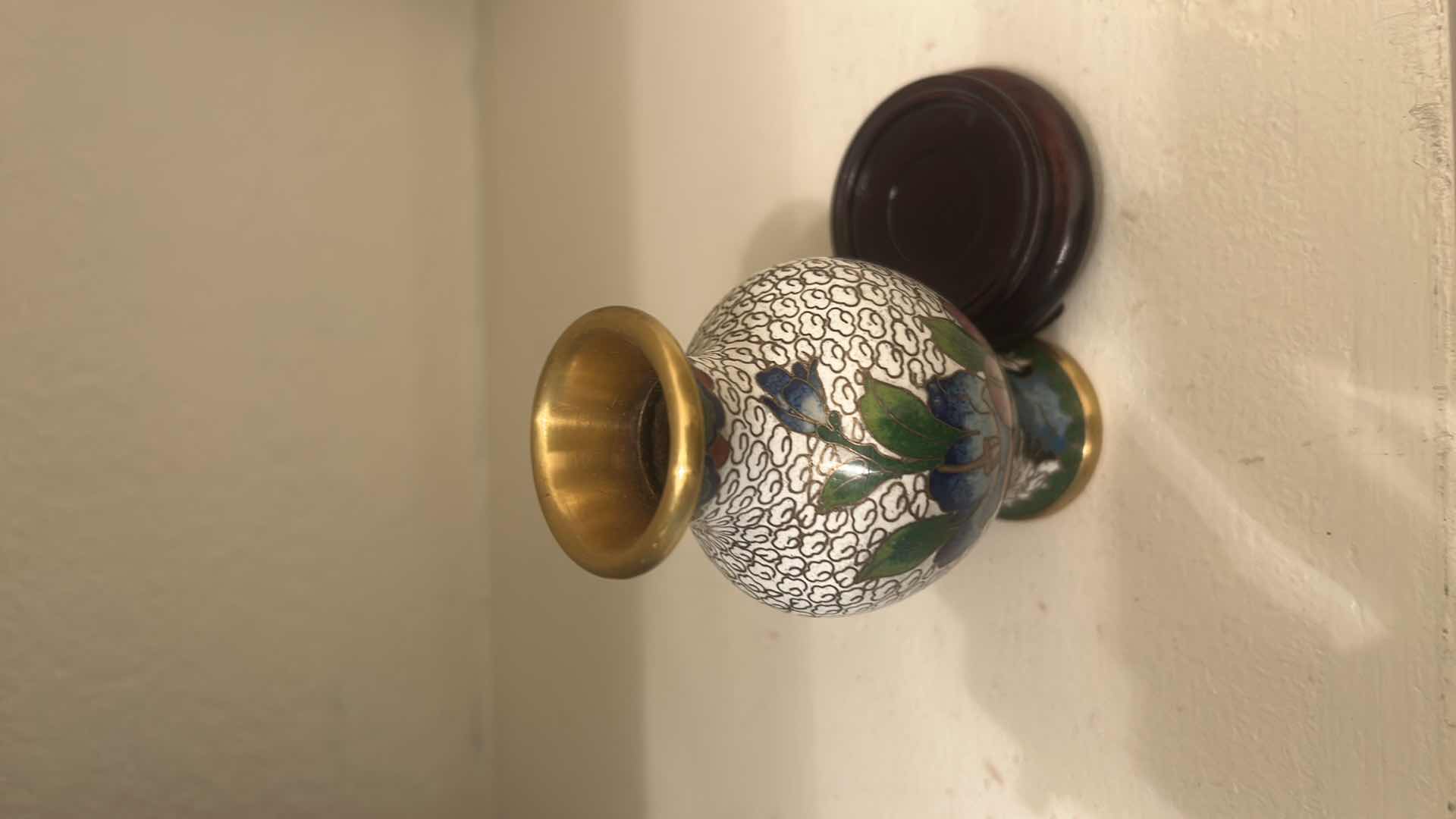 Photo 1 of MINIATURE ENAMEL OVER BRASS VASE H4” ON WOOD STAND