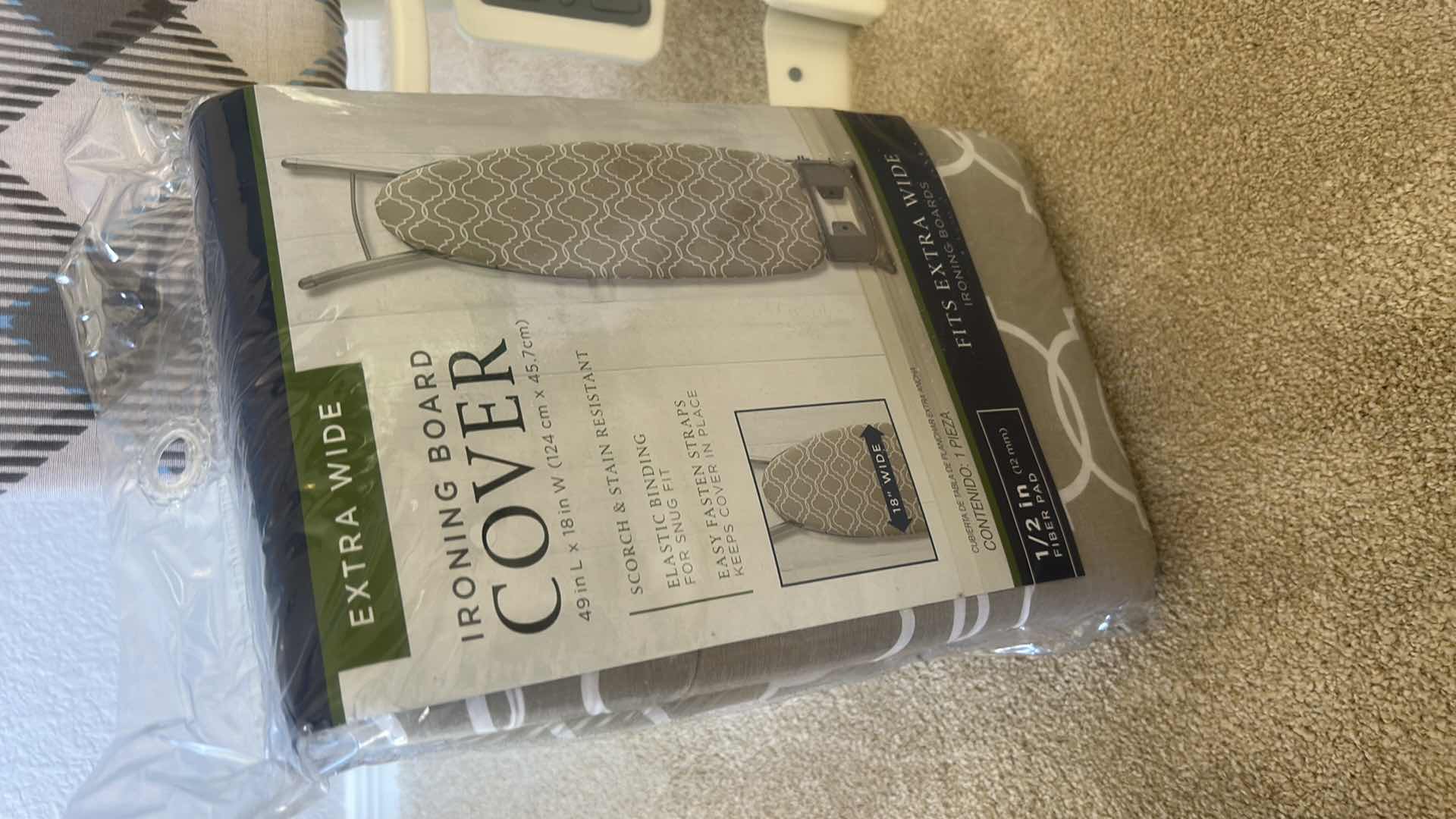 Photo 1 of IRONING BOARD & NEW IRONING BOARD COVER