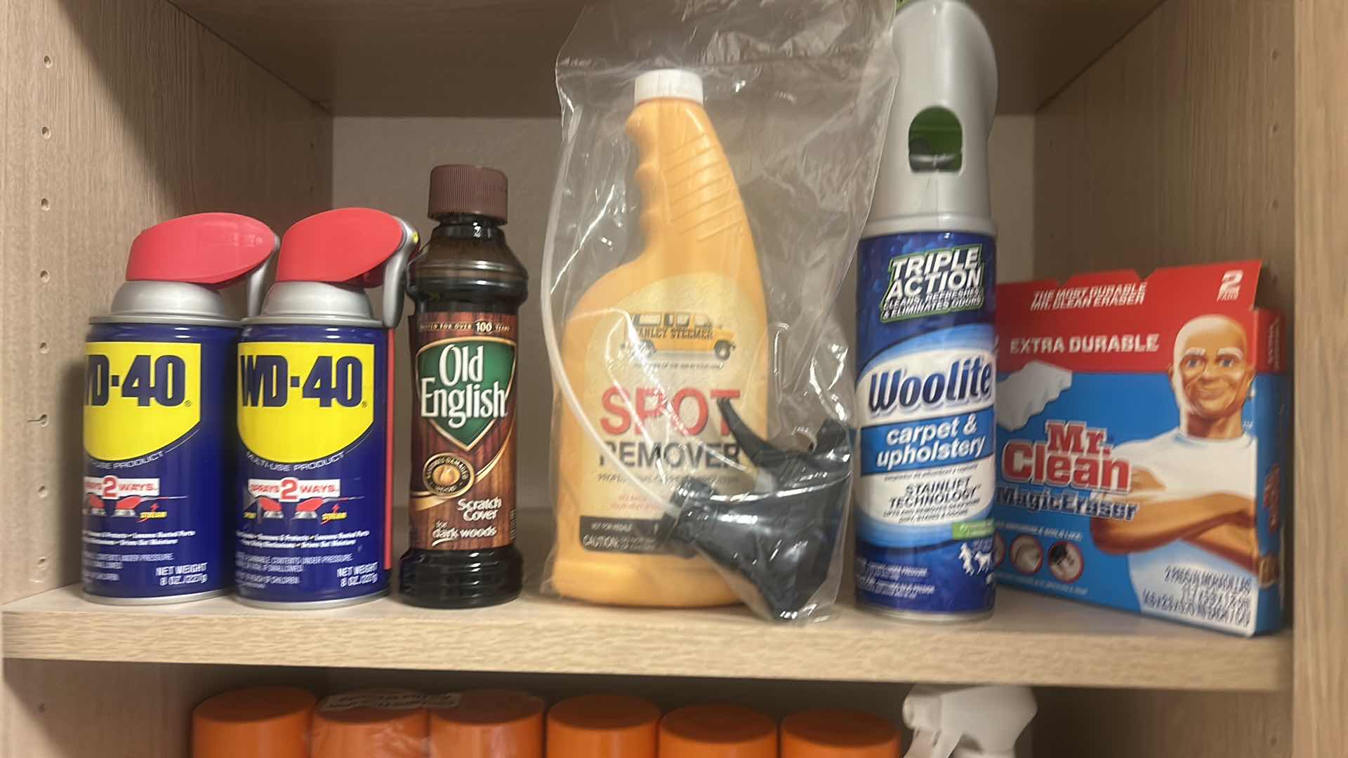 Photo 1 of CLEANING SUPPLIES IN CABINET