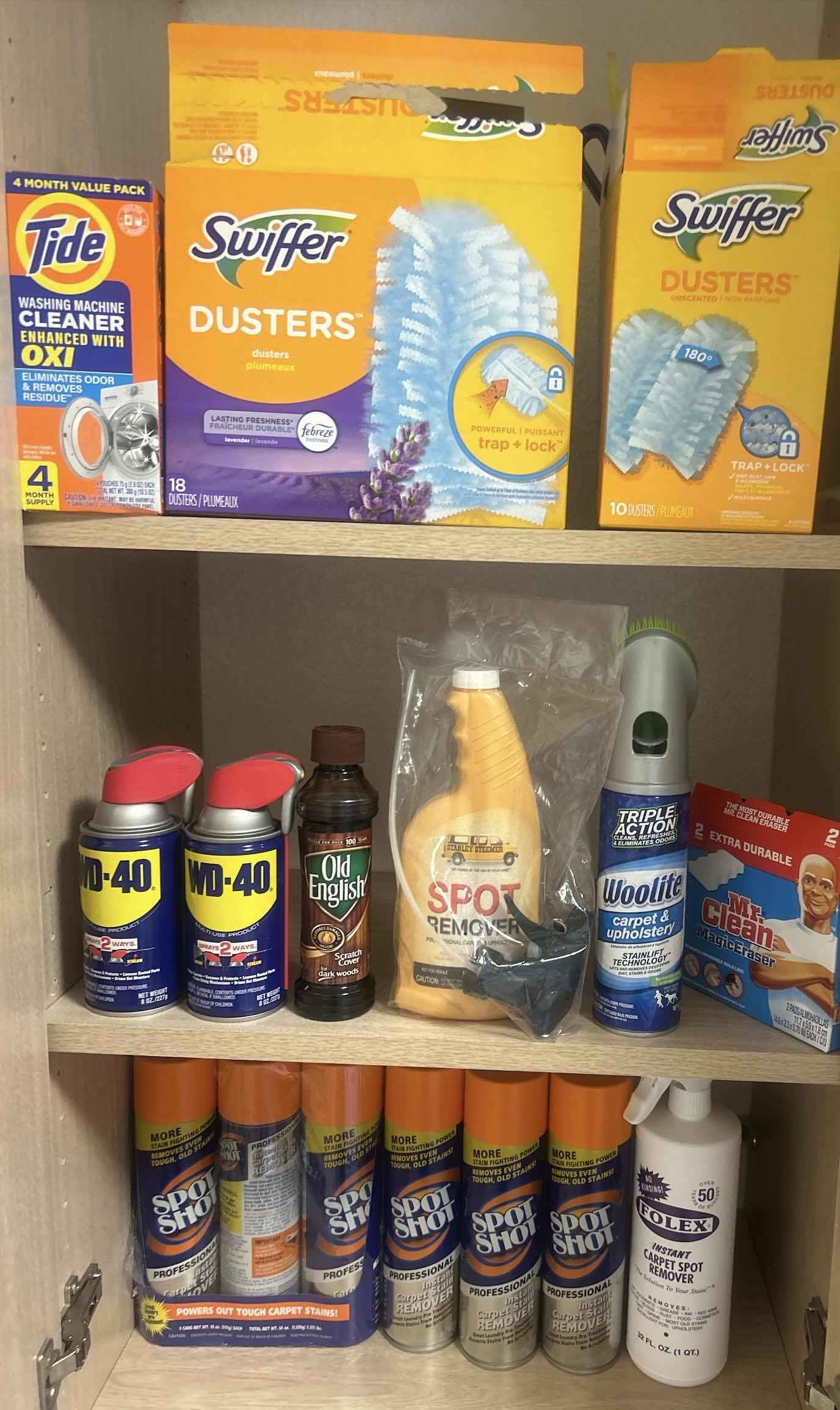 Photo 1 of CLEANING SUPPLIES IN CABINET