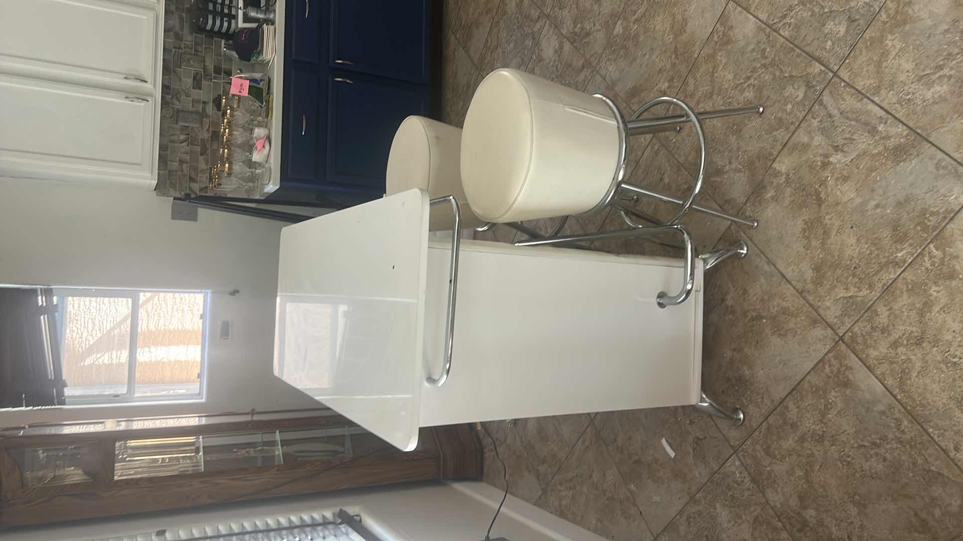 Photo 1 of FURNITURE OF AMERICA FUERO WHITE BAR TABLE WITH BUTTON TUFTING AND FAUX LEATHER UPHOLSTERY 47 1/4“ x 19 1/2“ x 42“ WITH 2 SWIVEL STOOLS. H29.25” $800