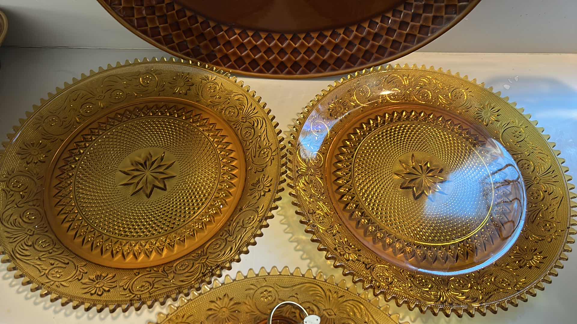 Photo 1 of AMBER GlASS PLATES, CERAMIC PUMPKINS AND DEEP BROWN/ AMBER CERAMIC PLATTER