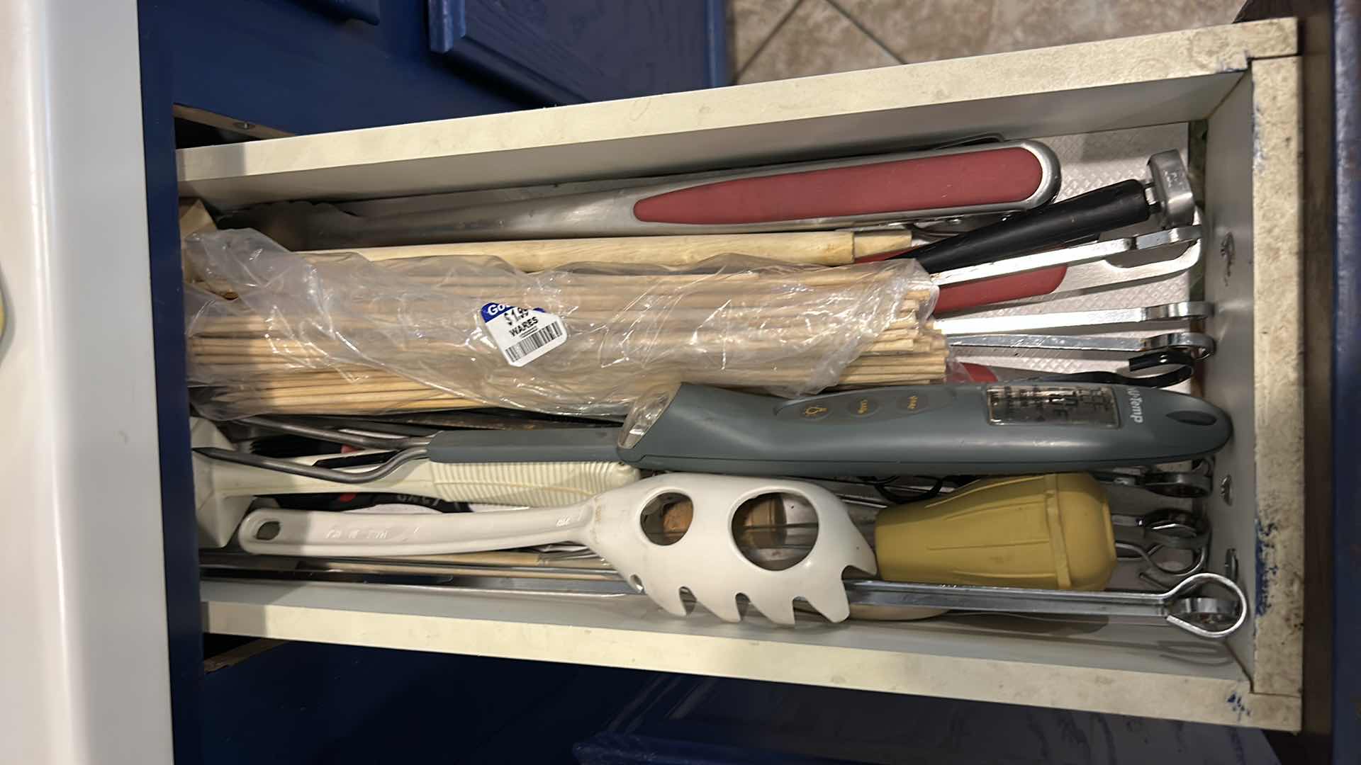 Photo 1 of CONTENTS OF DRAWER IN KITCHEN