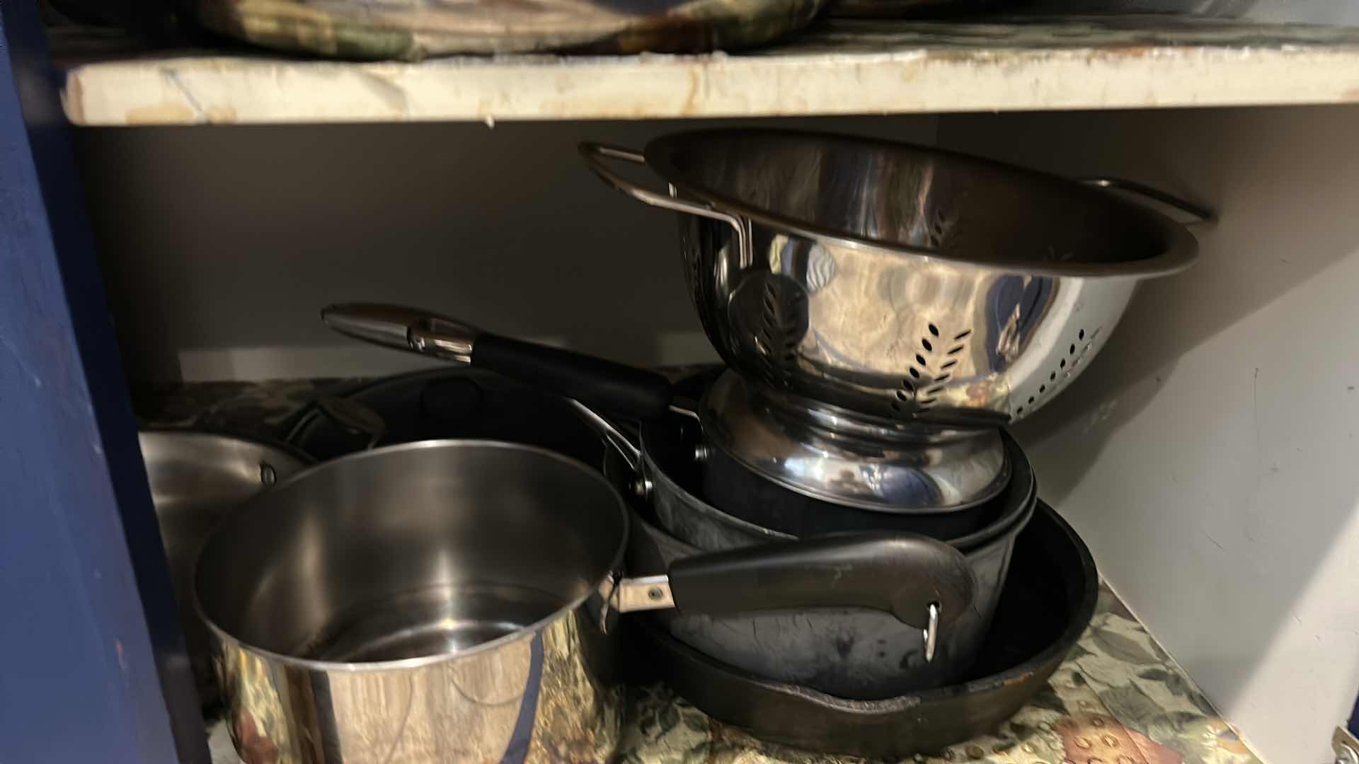 Photo 1 of CONTENTS OF CABINET IN KITCHEN- POTS AND PANS