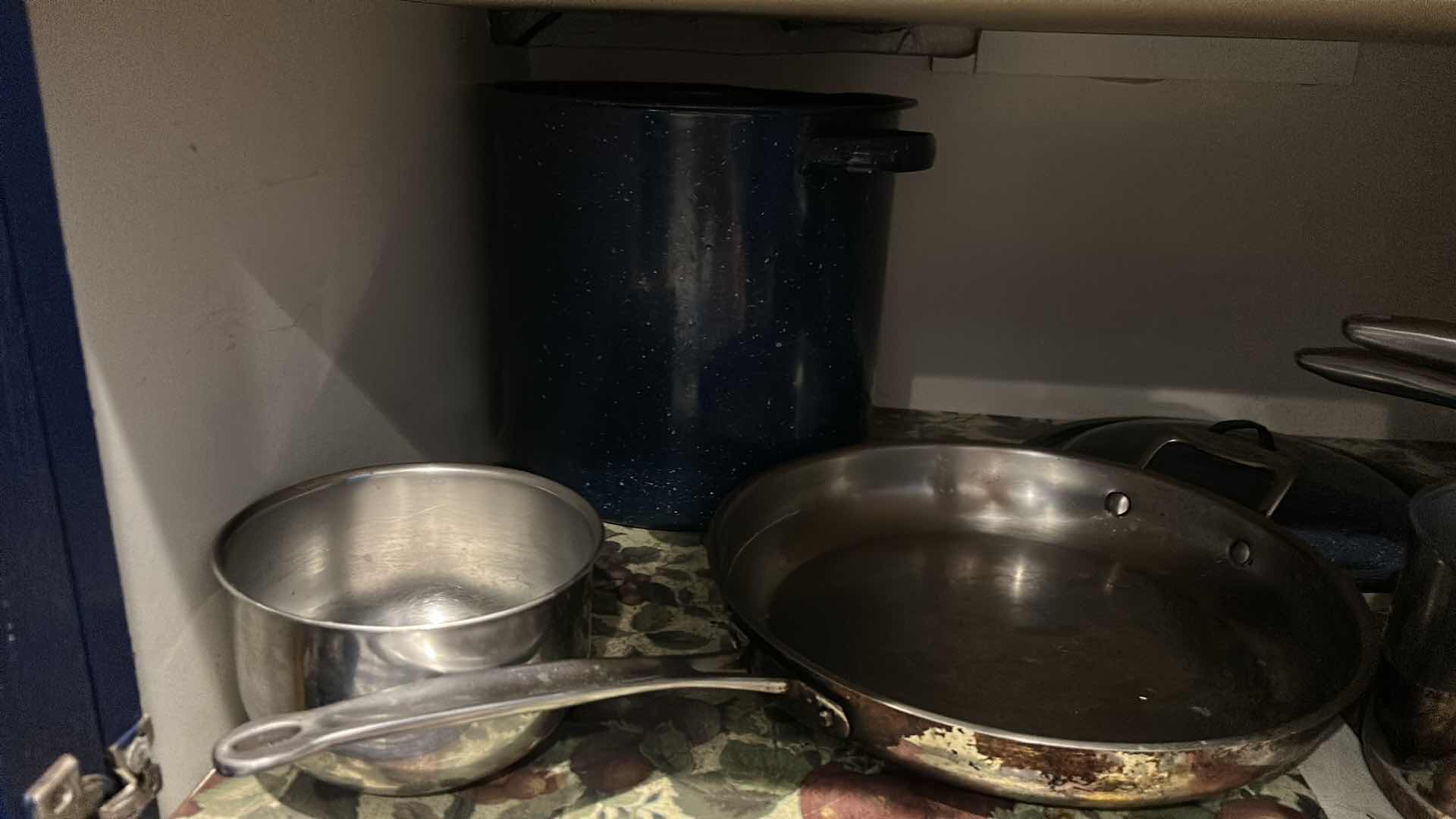 Photo 1 of CONTENTS OF CABINET IN KITCHEN- POTS AND PANS