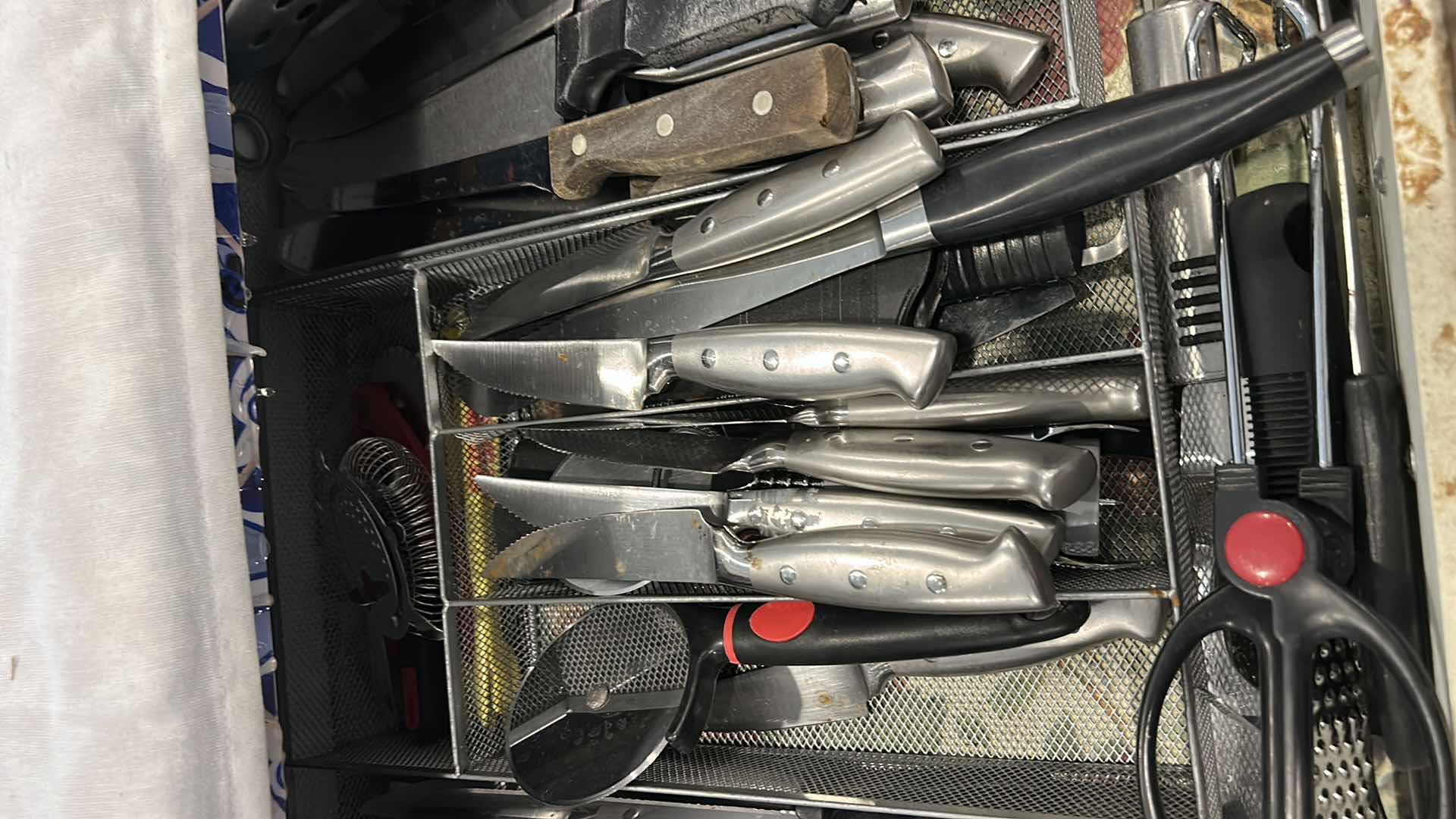 Photo 1 of CONTENTS OF DRAWER IN KICHEN - KNIVES AND MORE