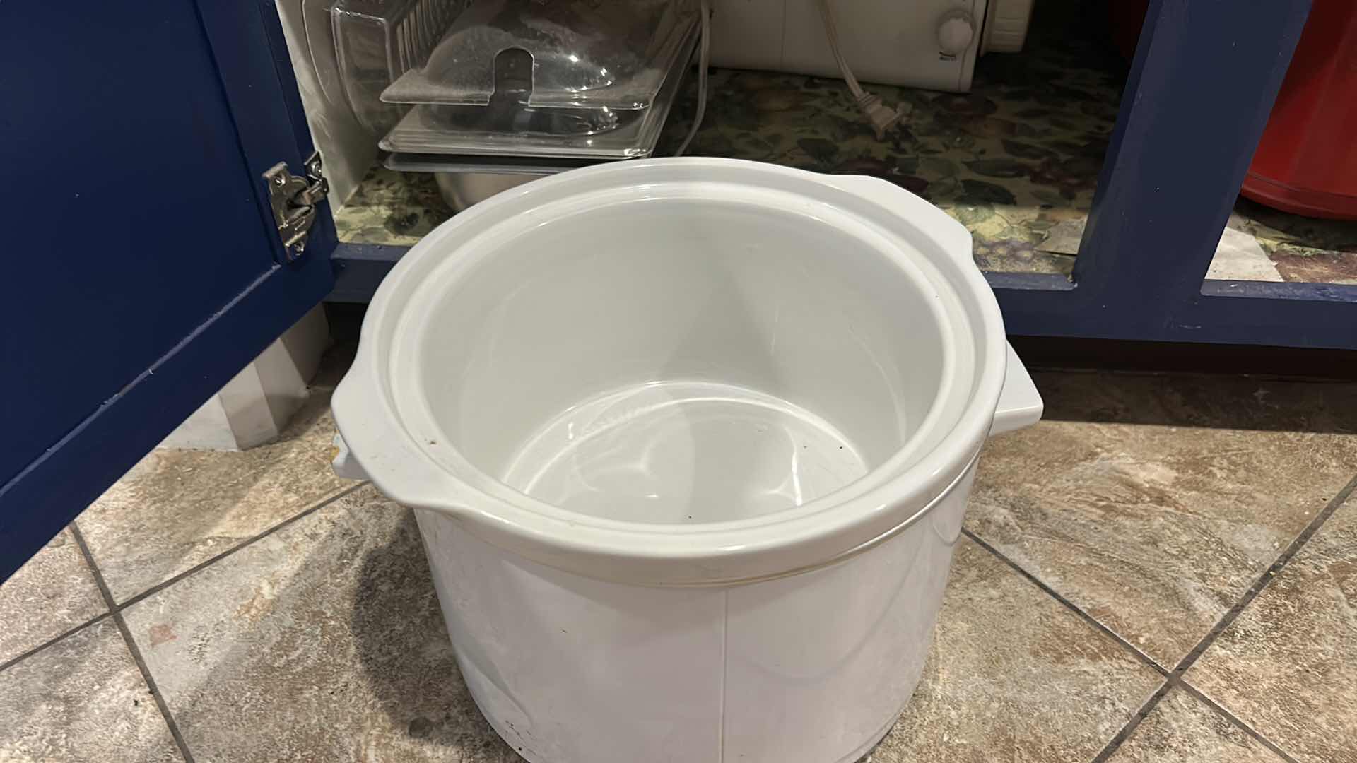 Photo 1 of CONTENTS OF CABINET IN KITCHEN