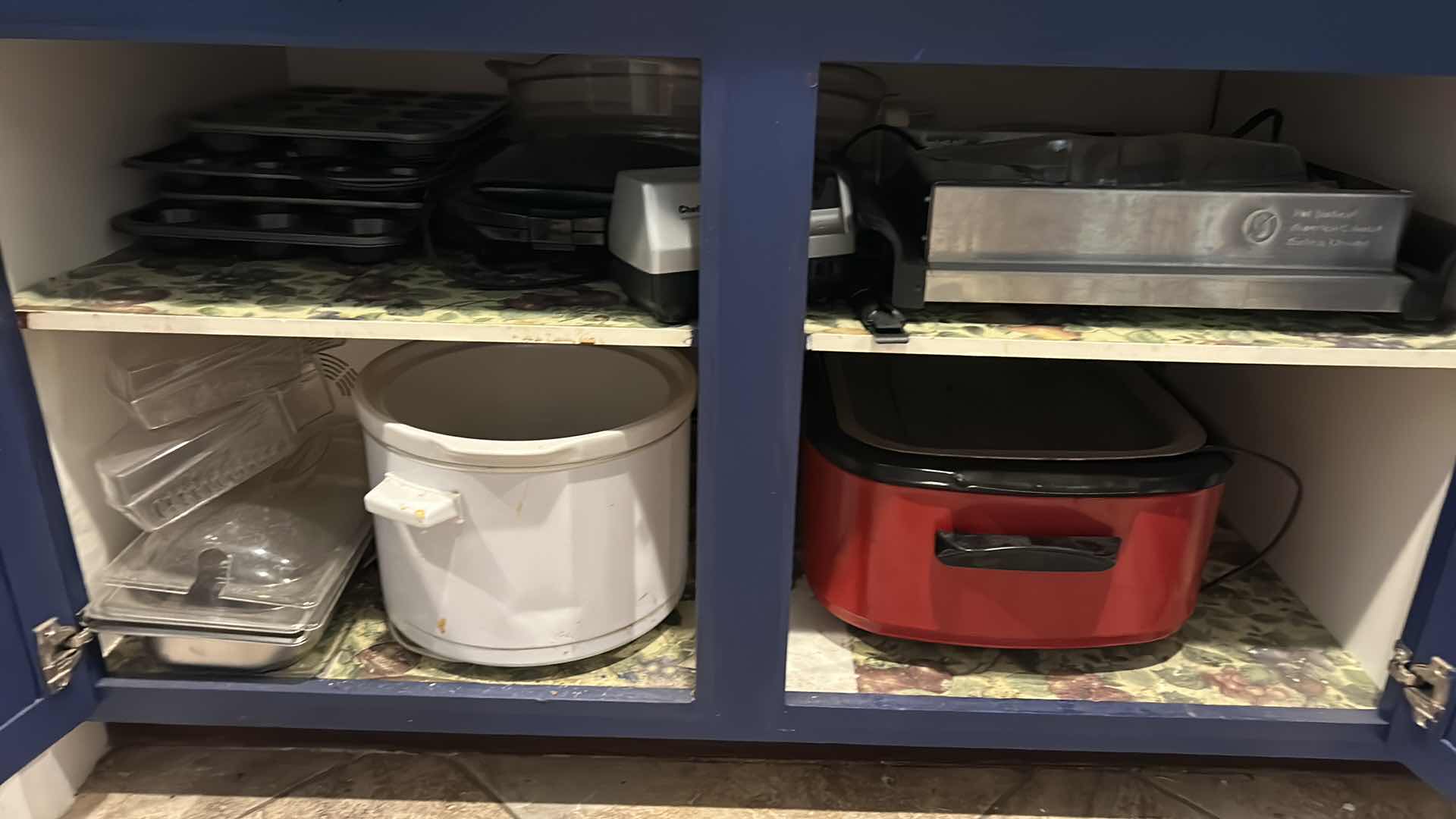 Photo 1 of CONTENTS OF CABINET IN KITCHEN