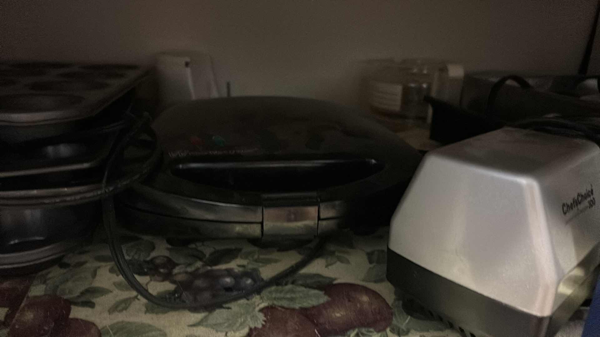 Photo 1 of CONTENTS OF CABINET IN KITCHEN