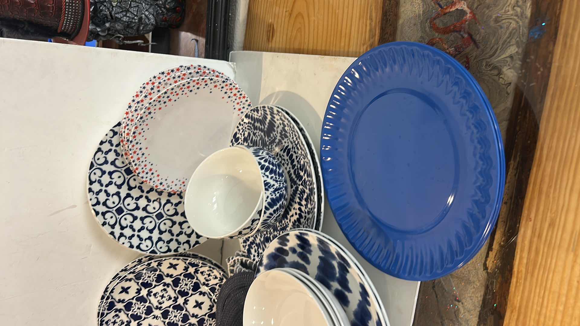 Photo 1 of PLACEMATS, BLUE AND WHITE PLATES, BOWLS AND ACRYLIC STAR