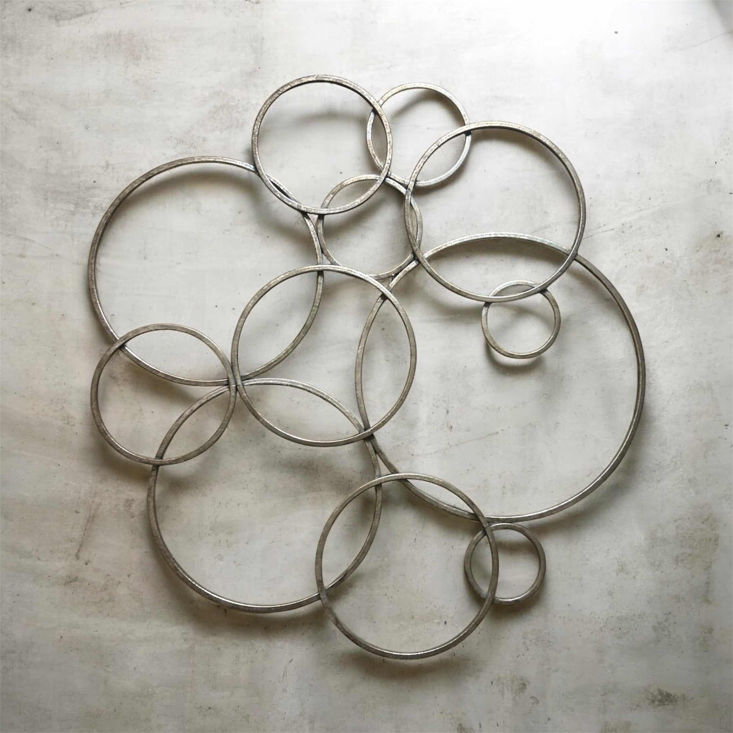 Photo 1 of METAL CIRCLE WALL SCULPTURE 30” x H31”