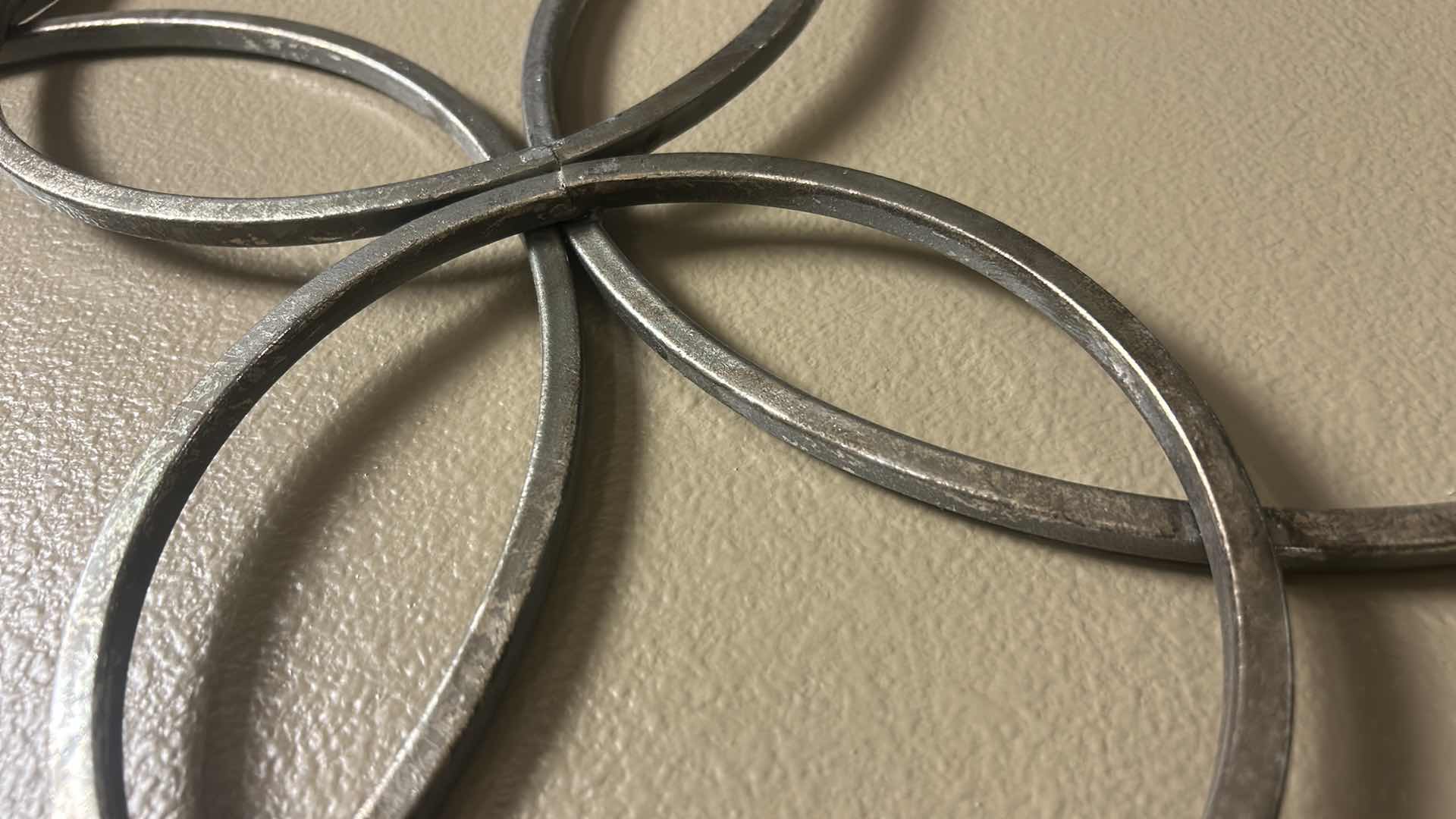 Photo 1 of METAL CIRCLE WALL SCULPTURE 30” x H31”