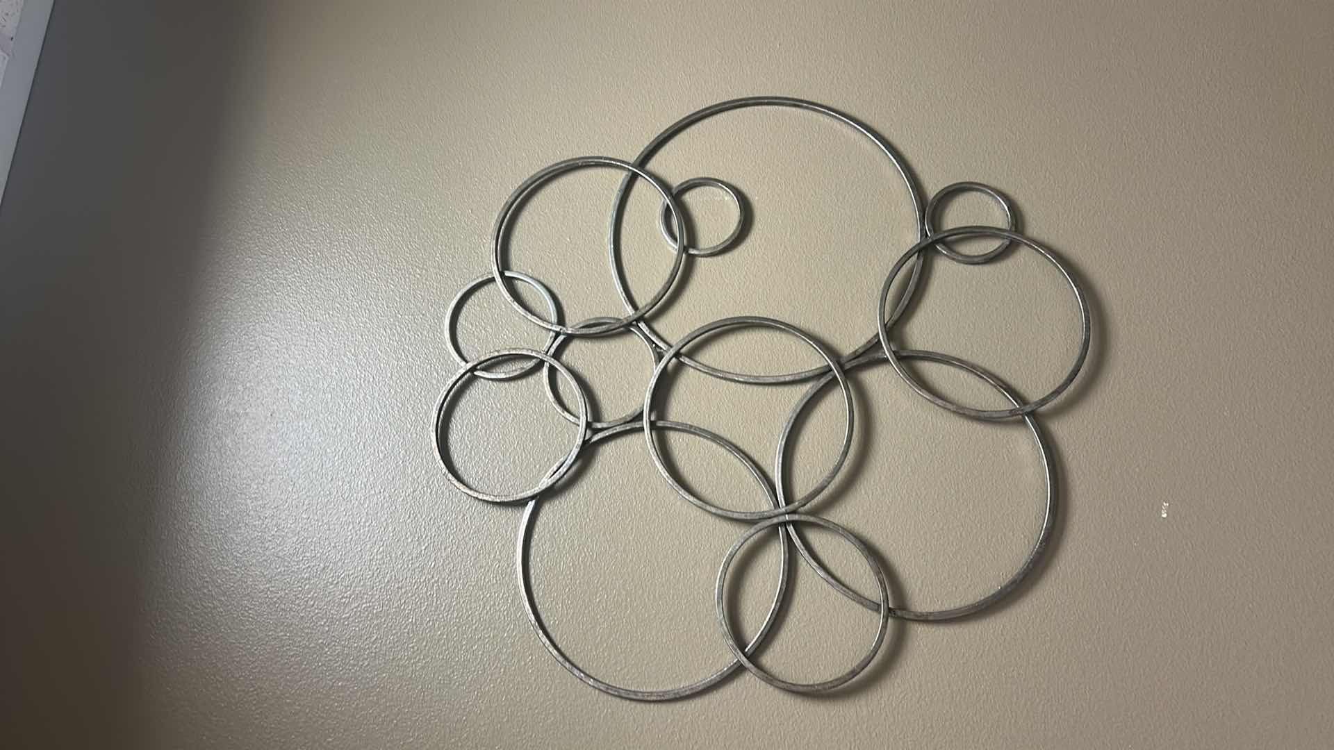 Photo 1 of METAL CIRCLE WALL SCULPTURE 30” x H31”
