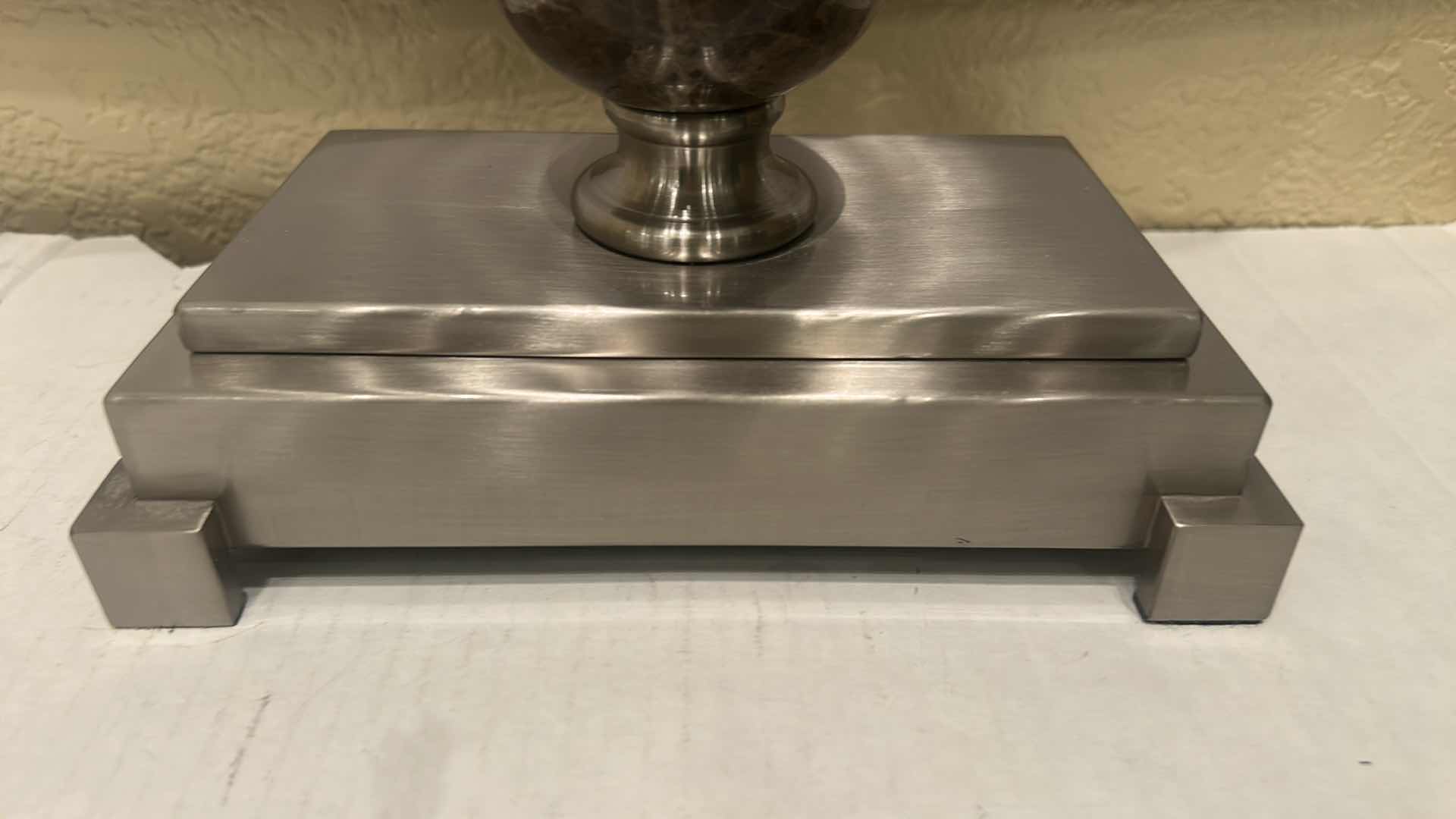 Photo 1 of - METAL THREE-ARM CANDELABRA, POSSIBLY WITH A PEWTER, SILVER, OR BRUSHED METAL FINISH. H26”