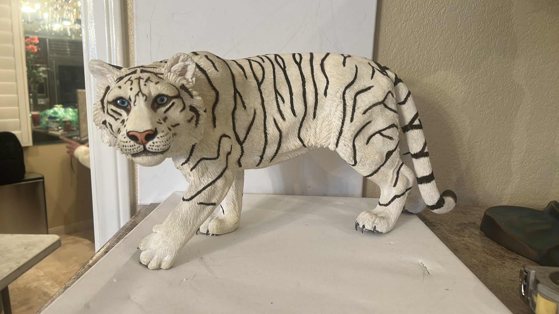 Photo 1 of RESIN WHITE TIGER FIGURINE, REALISTIC WILDLIFE SCULPTURE, HAND-PAINTED SAFARI DECOR, STATEMENT ANIMAL ACCENT PIECE. 20” x H10”