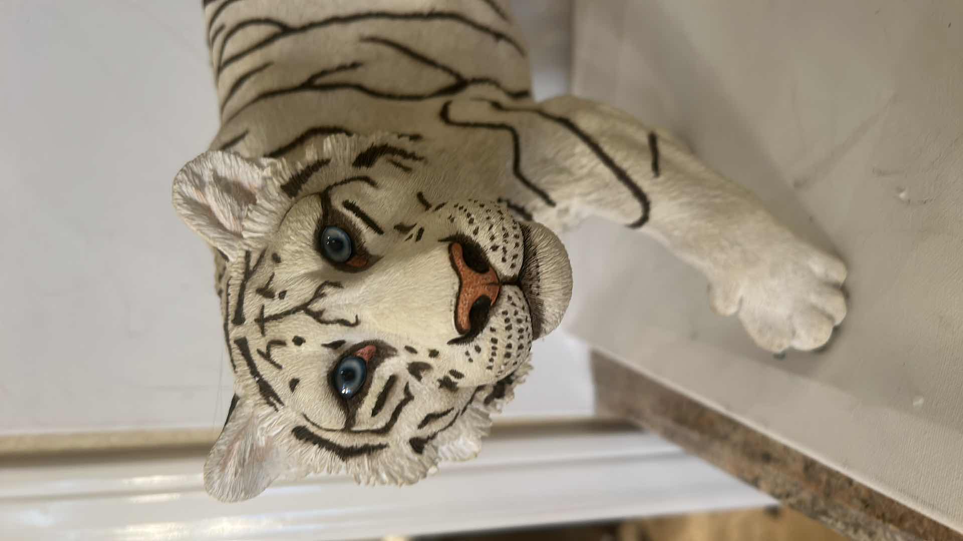 Photo 1 of RESIN WHITE TIGER FIGURINE, REALISTIC WILDLIFE SCULPTURE, HAND-PAINTED SAFARI DECOR, STATEMENT ANIMAL ACCENT PIECE. 20” x H10”