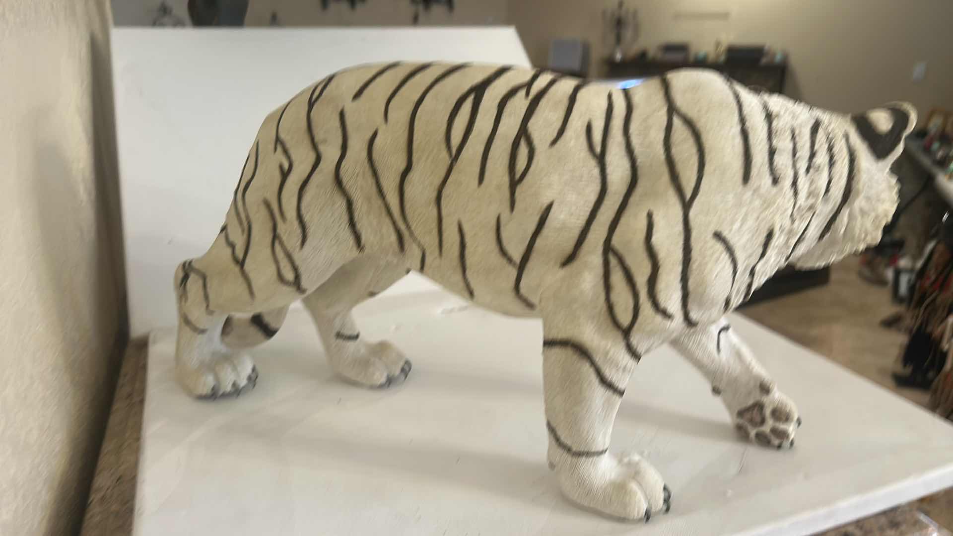 Photo 1 of RESIN WHITE TIGER FIGURINE, REALISTIC WILDLIFE SCULPTURE, HAND-PAINTED SAFARI DECOR, STATEMENT ANIMAL ACCENT PIECE. 20” x H10”