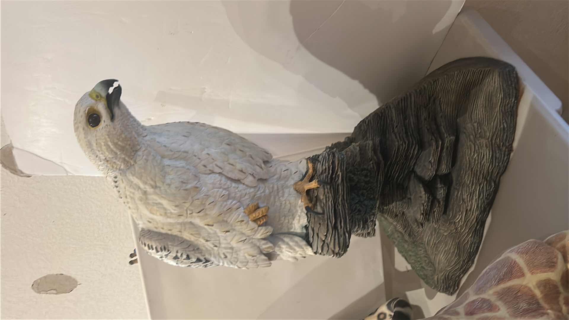 Photo 1 of CERAMIC FALCON FIGURINE PERCHED ON ROCK BASE, WILDLIFE SCULPTURAL DECOR PIECE. 18“ x H25“